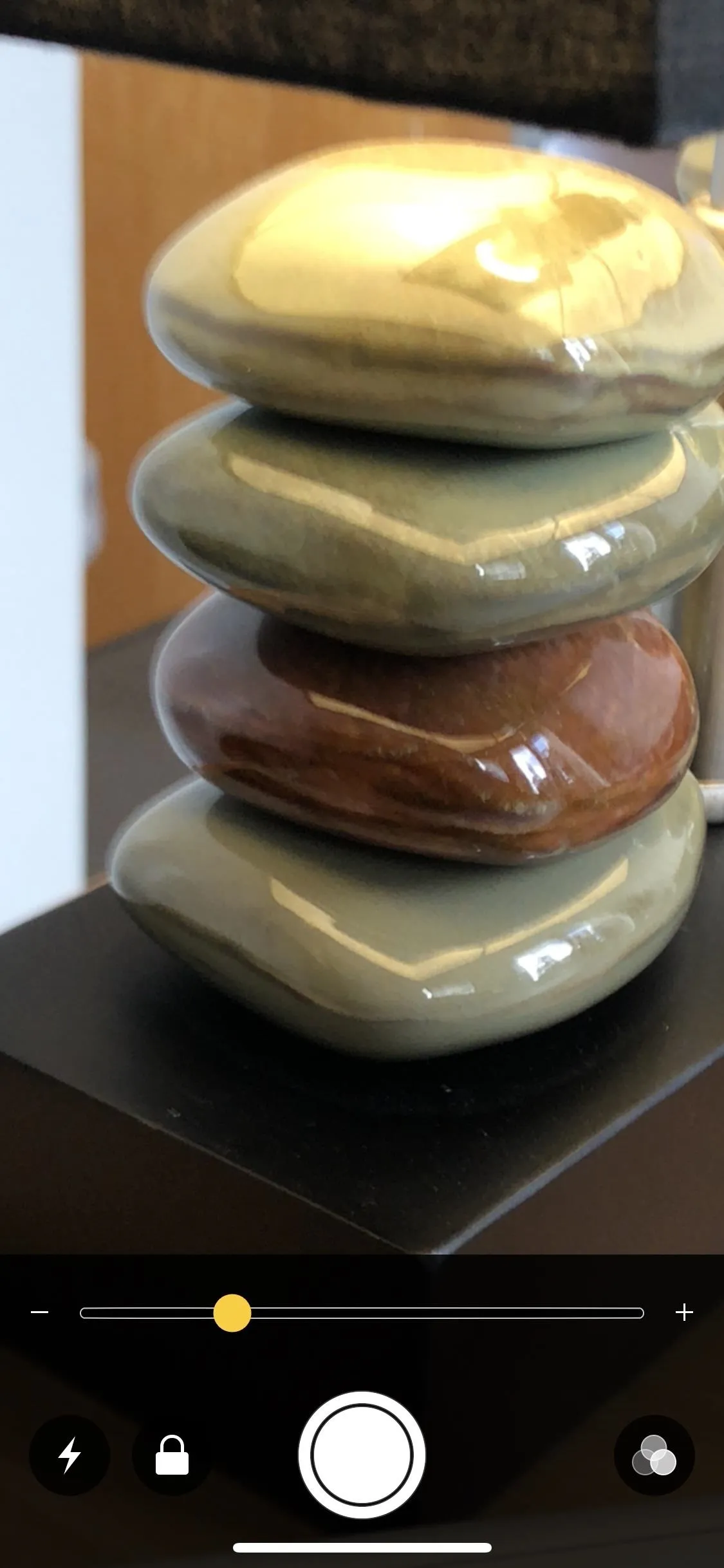 Stacked smooth stones in neutral colors.