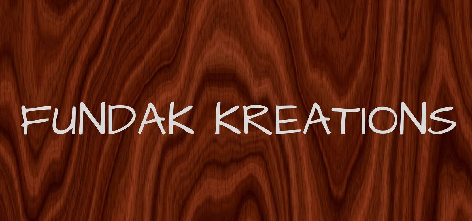 Fundak Kreations logo on a wooden background.