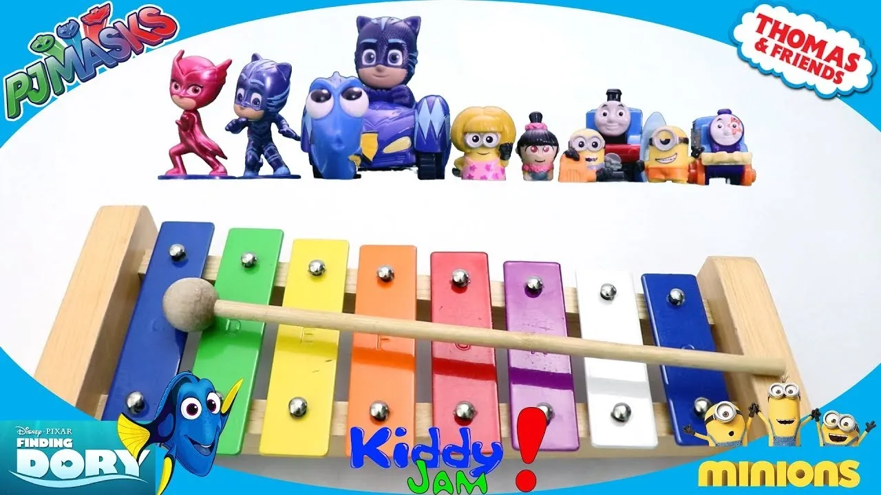 Colorful xylophone with cartoon character figurines in the background.