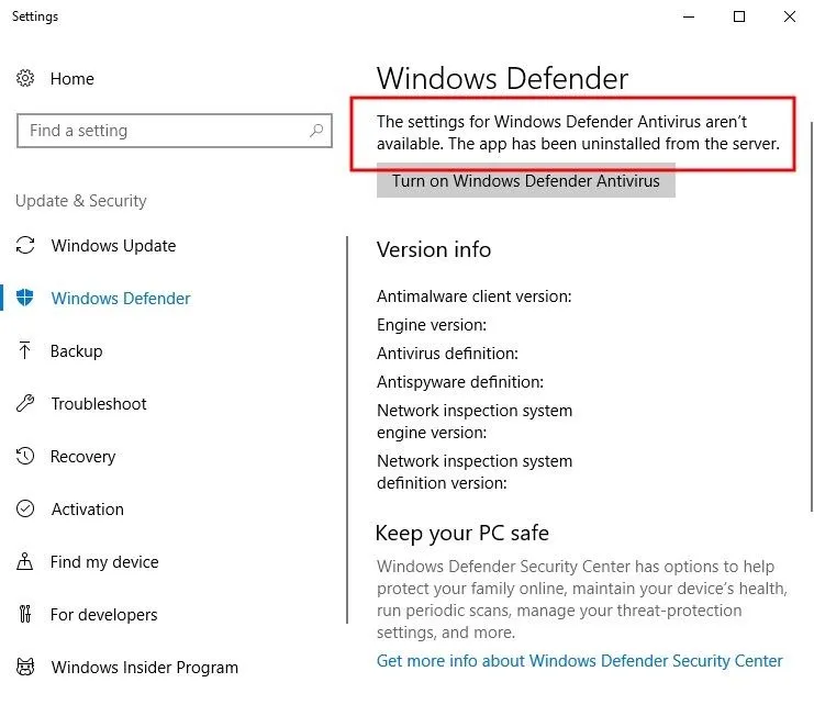 Windows Defender settings window with warning about unavailability of certain options.