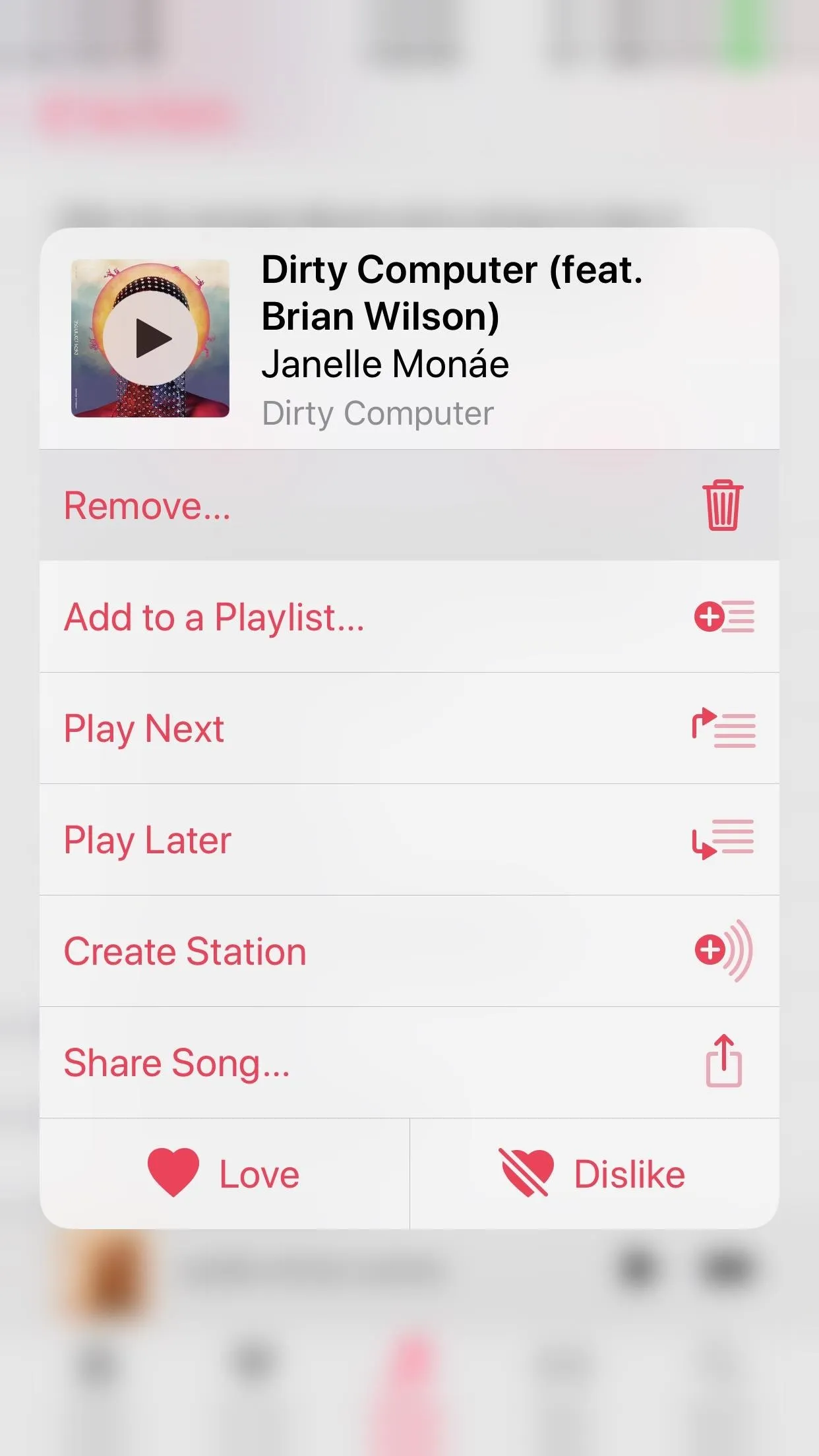 Music playlist interface featuring the song "Dirty Computer" by Janelle Monáe with options to add to a playlist, play next, play later, create a device, and stream.