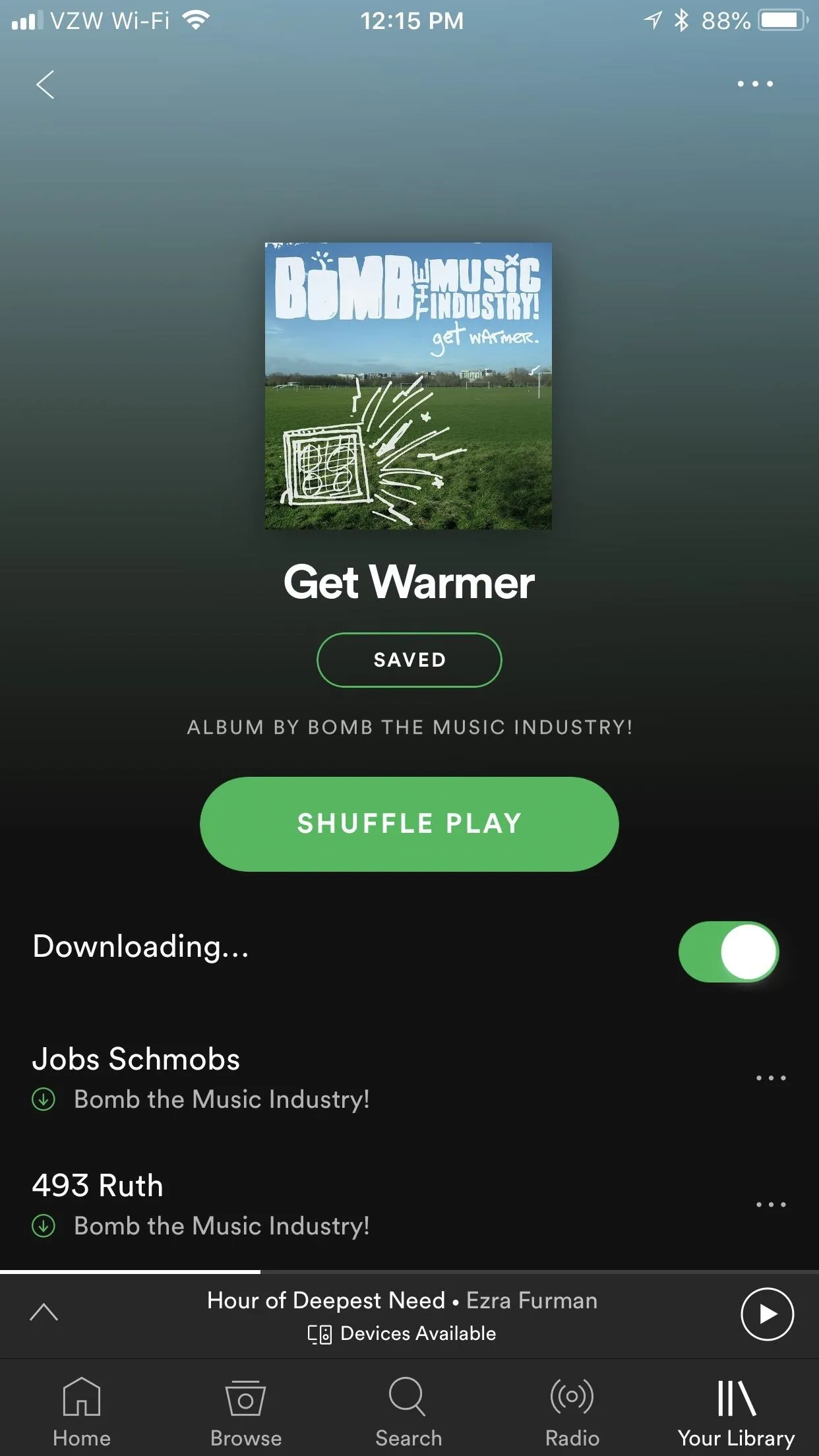 Album cover for "Get Warmer" on Spotify with download details displayed.