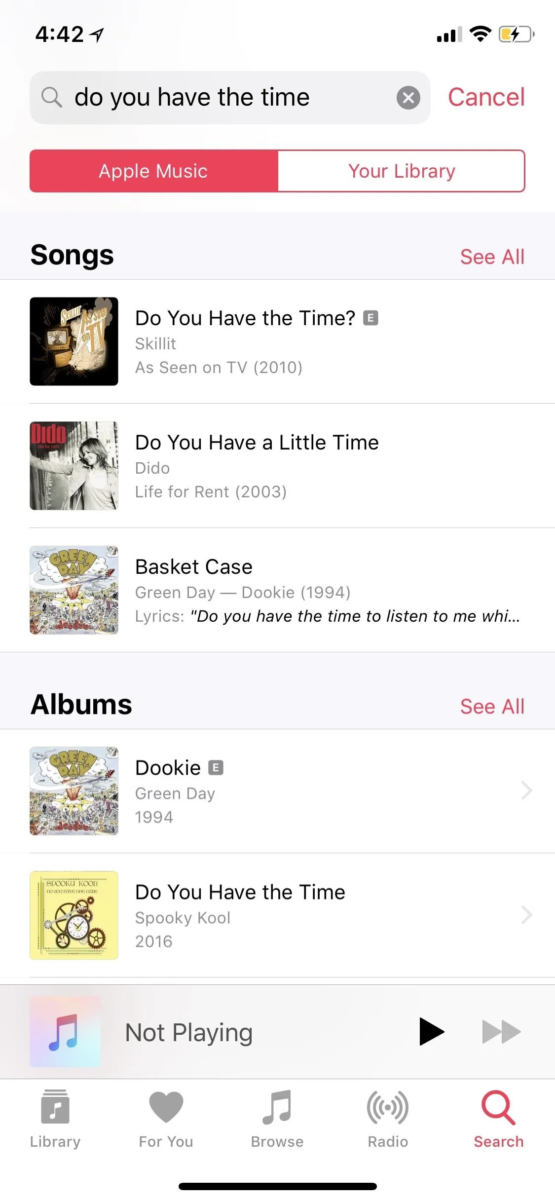 Music streaming interface showcasing song and album listings.