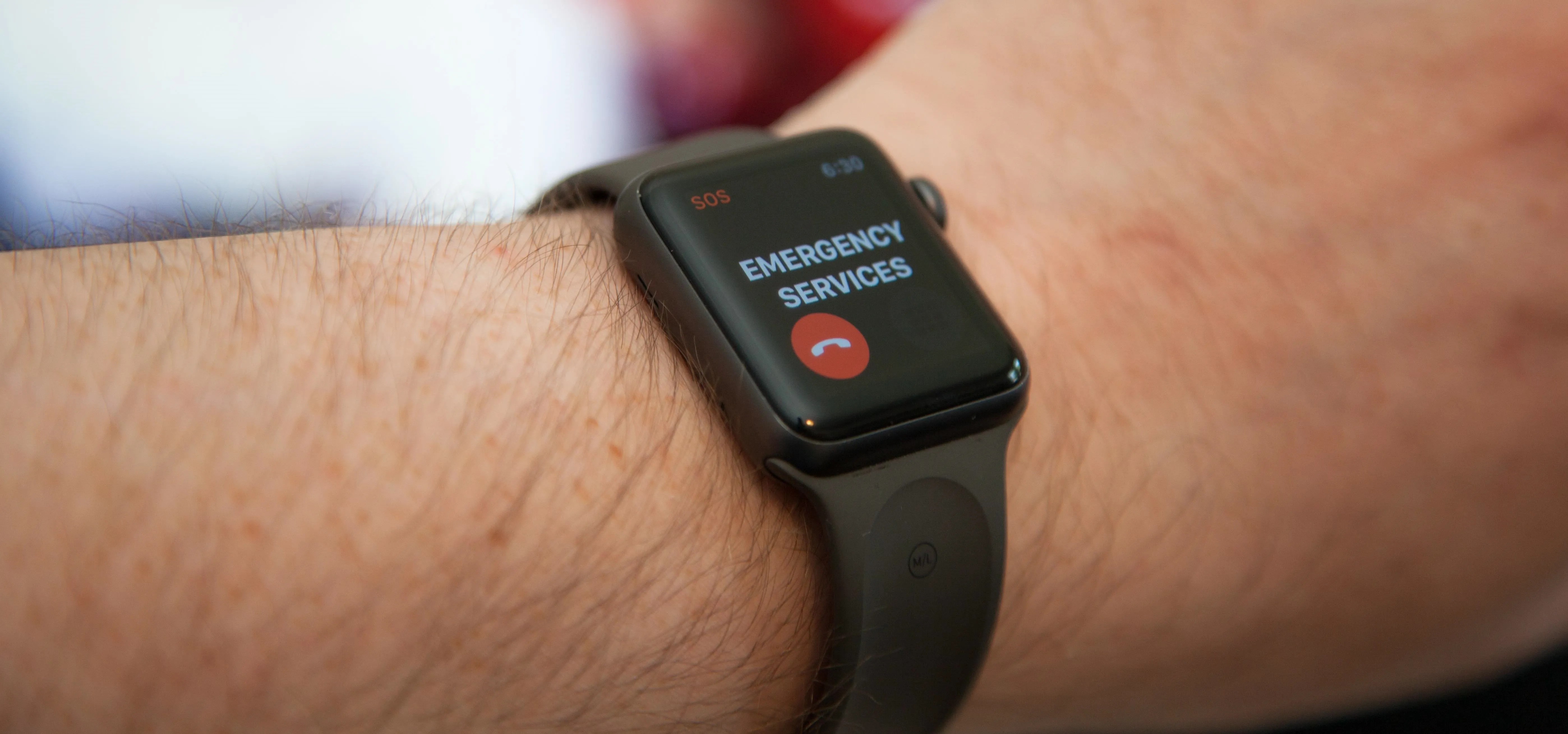 Smartwatch displaying an emergency services alert.