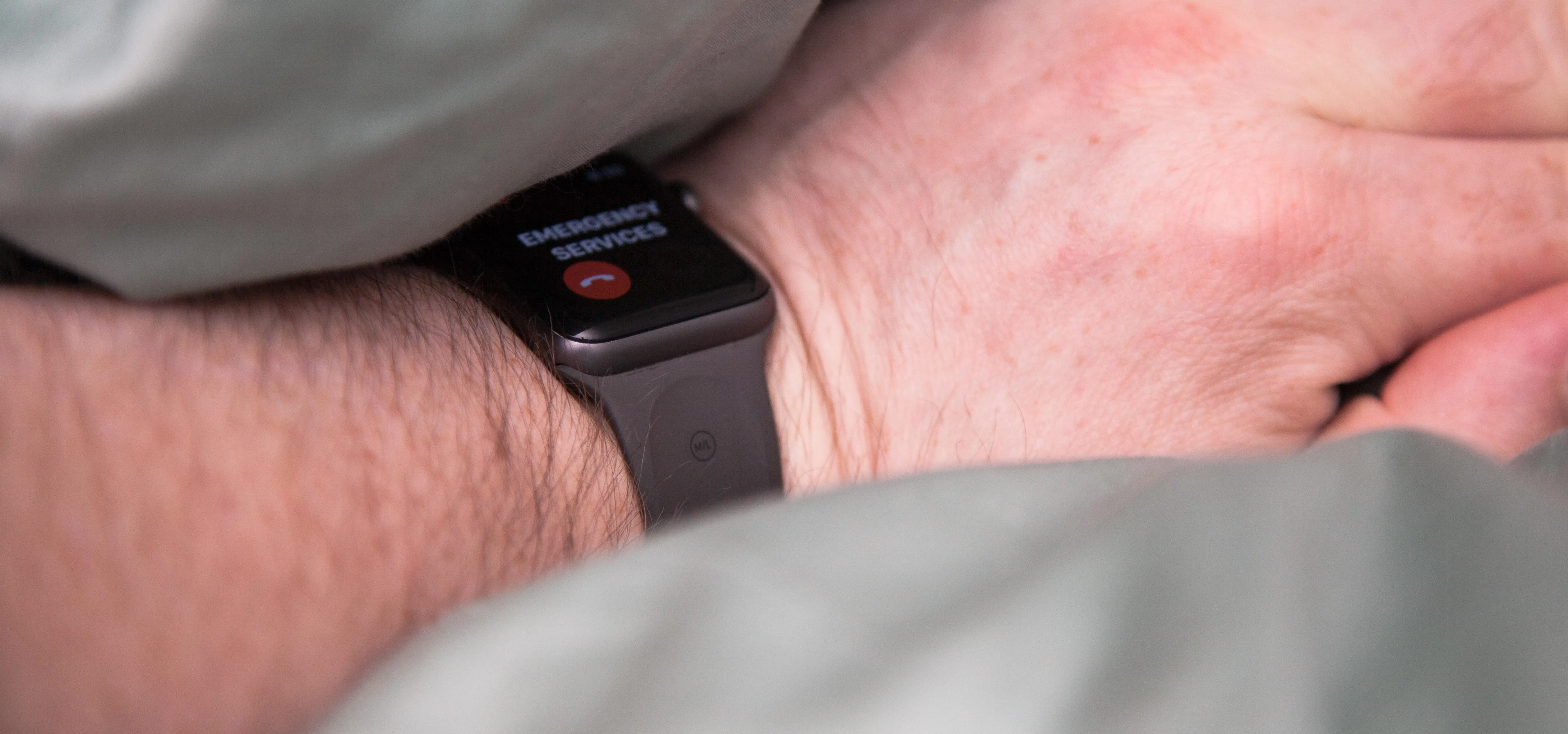 Smartwatch worn on a wrist, displaying a notification.