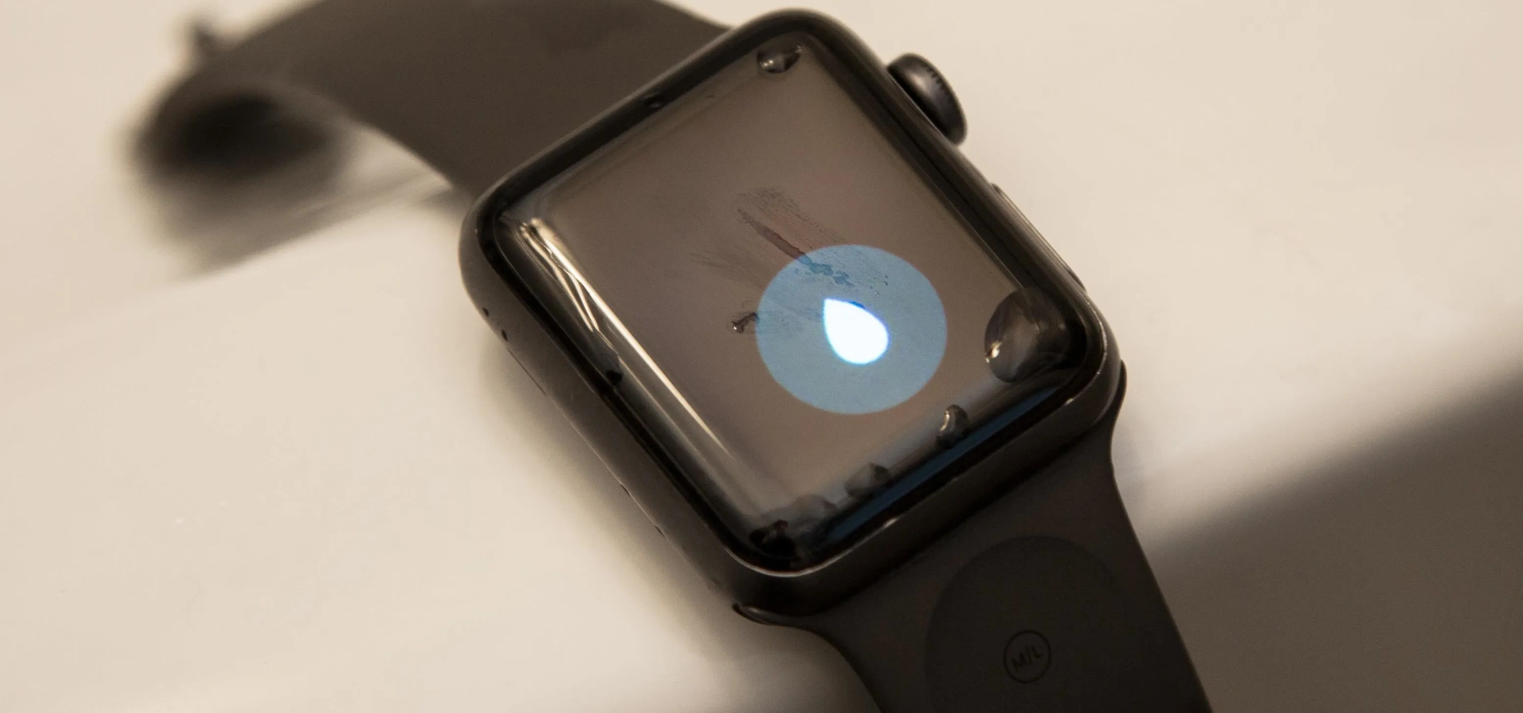 Smartwatch with a water droplet icon displayed on the screen.