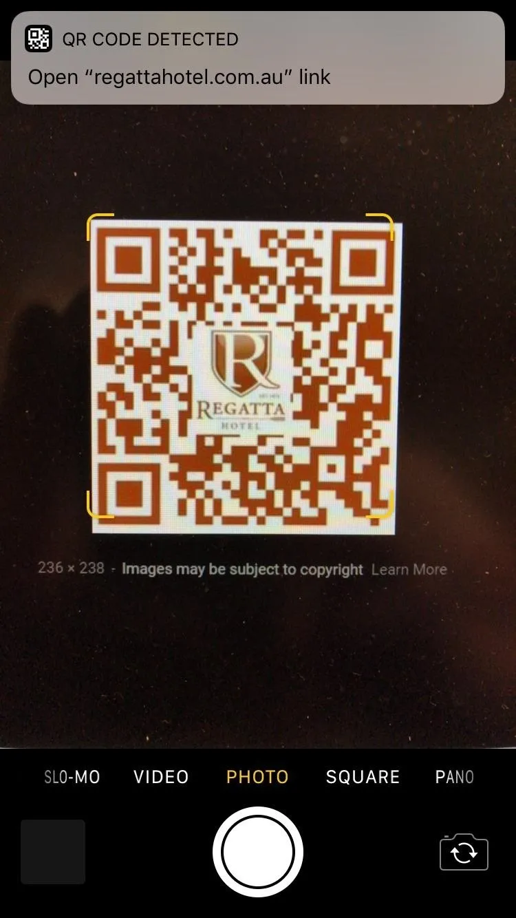 QR code on a smartphone screen.