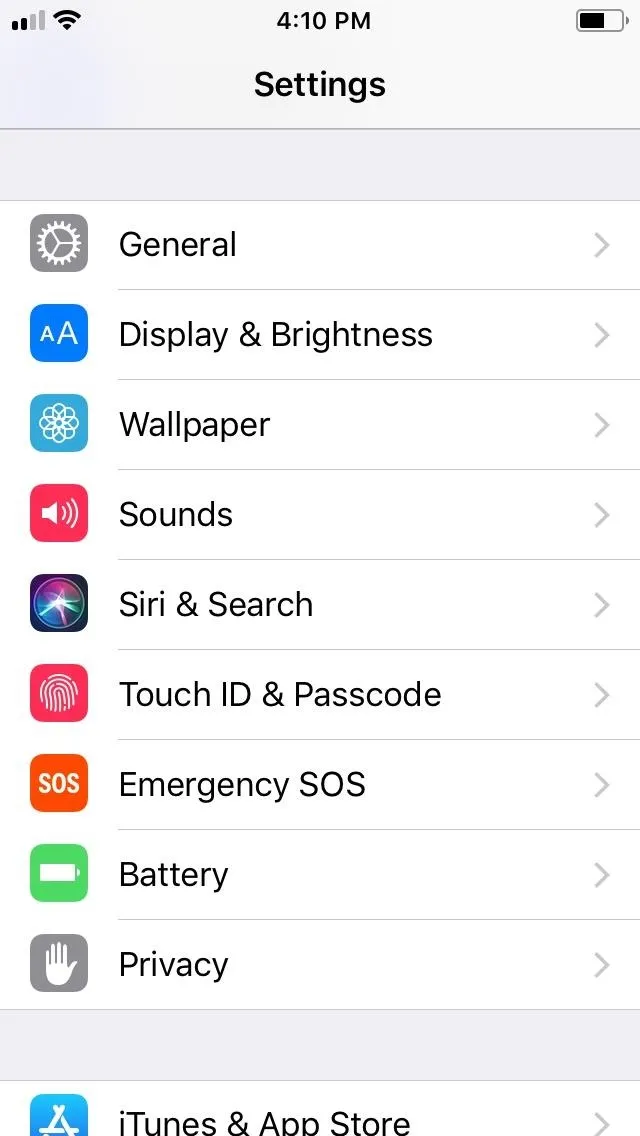 iPhone settings menu with various options like General, Display & Brightness, and Battery.