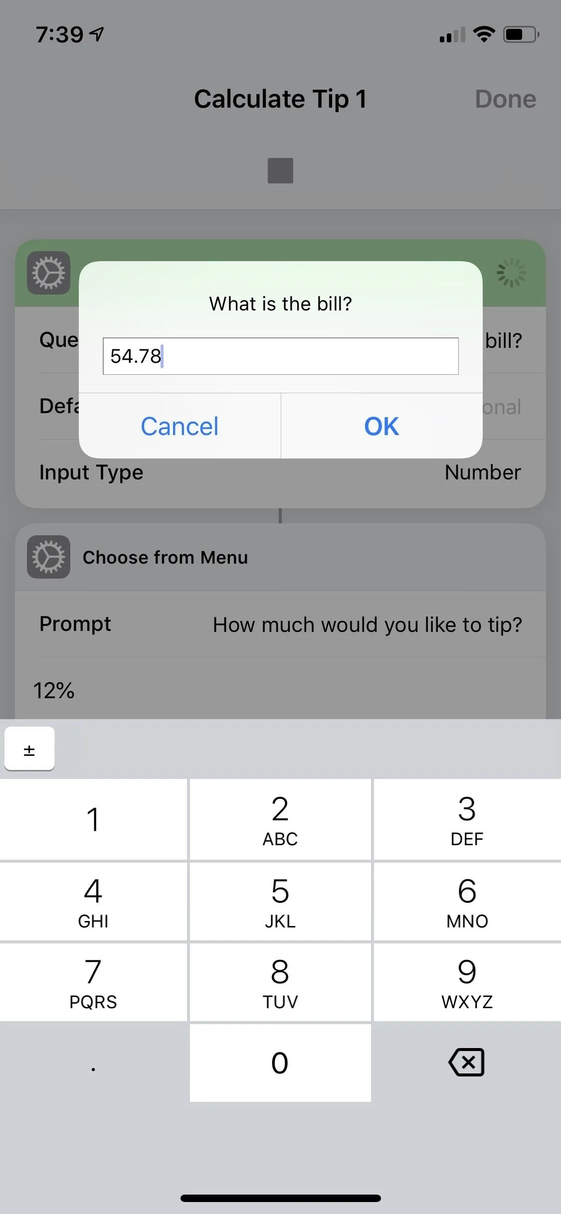 Calculator showing a tip calculation interface on a mobile device.