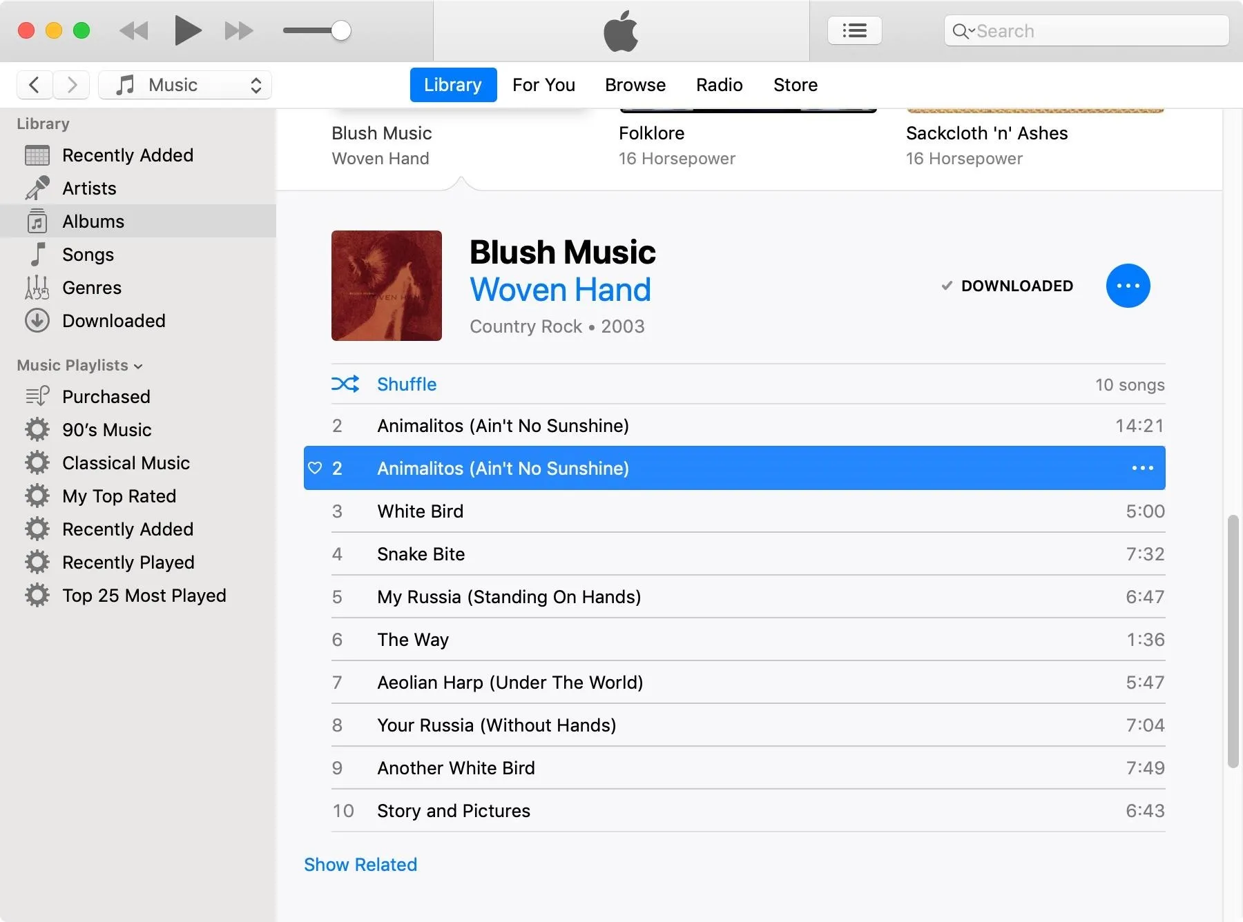 Wovenhand album "Blush Music" displayed in iTunes with track list.