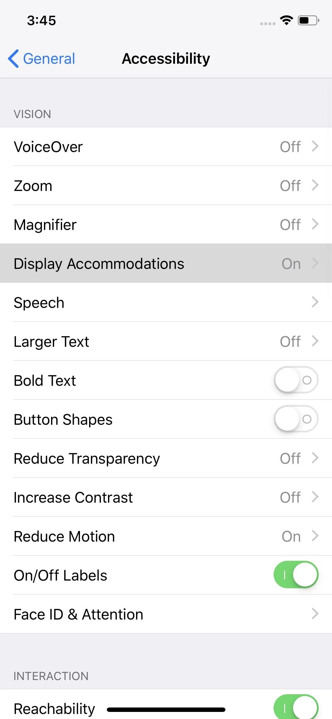 Accessibility settings on a mobile device with options for text size and display adjustments.