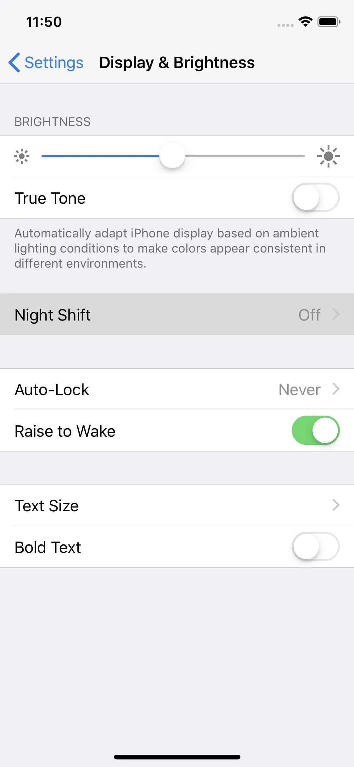 Settings screen for display and brightness options on a mobile device.