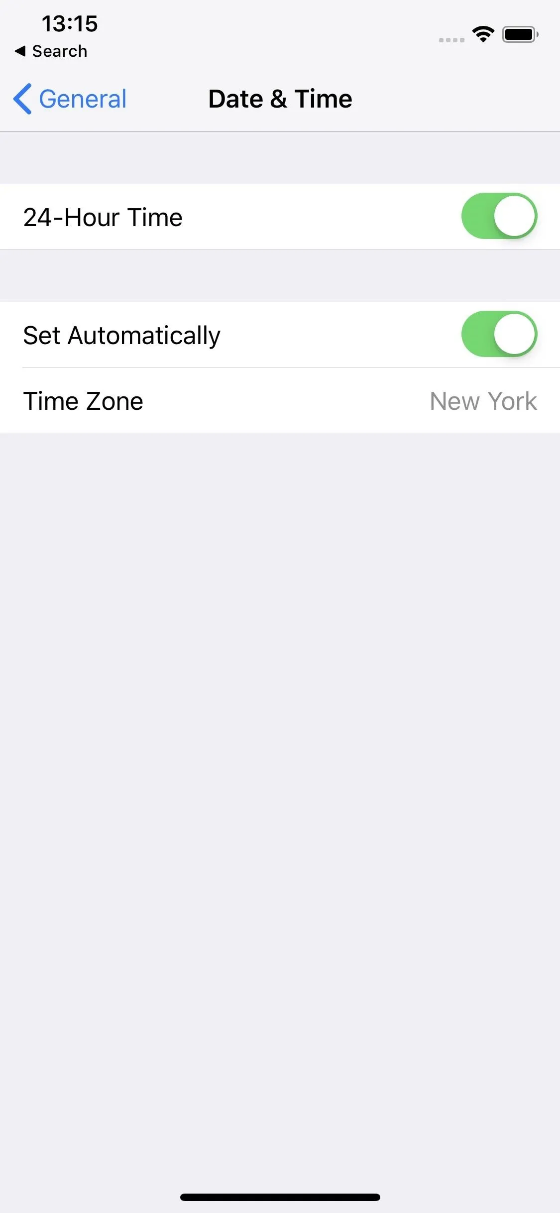 Settings menu for date and time configuration on a mobile device.