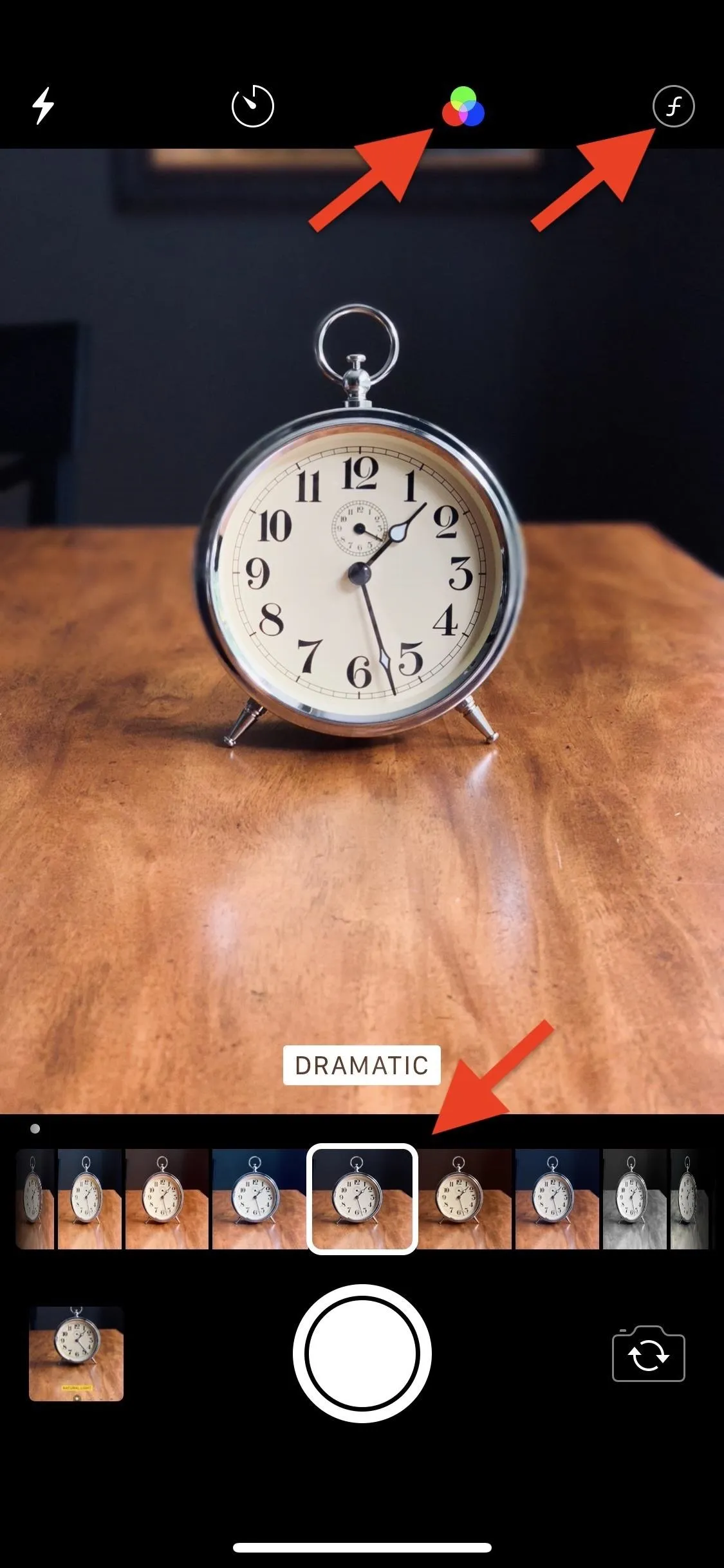 An antique clock on a wooden surface with camera interface elements.