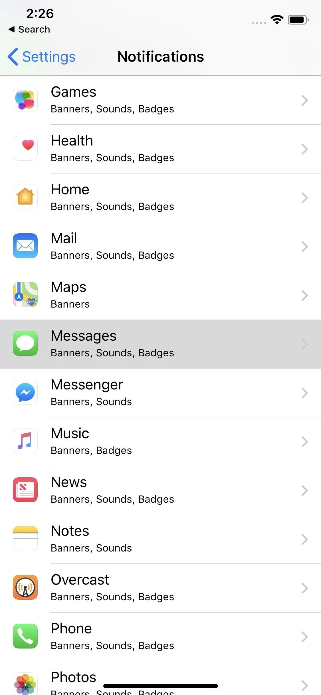 Settings menu of an iPhone displaying various app options.