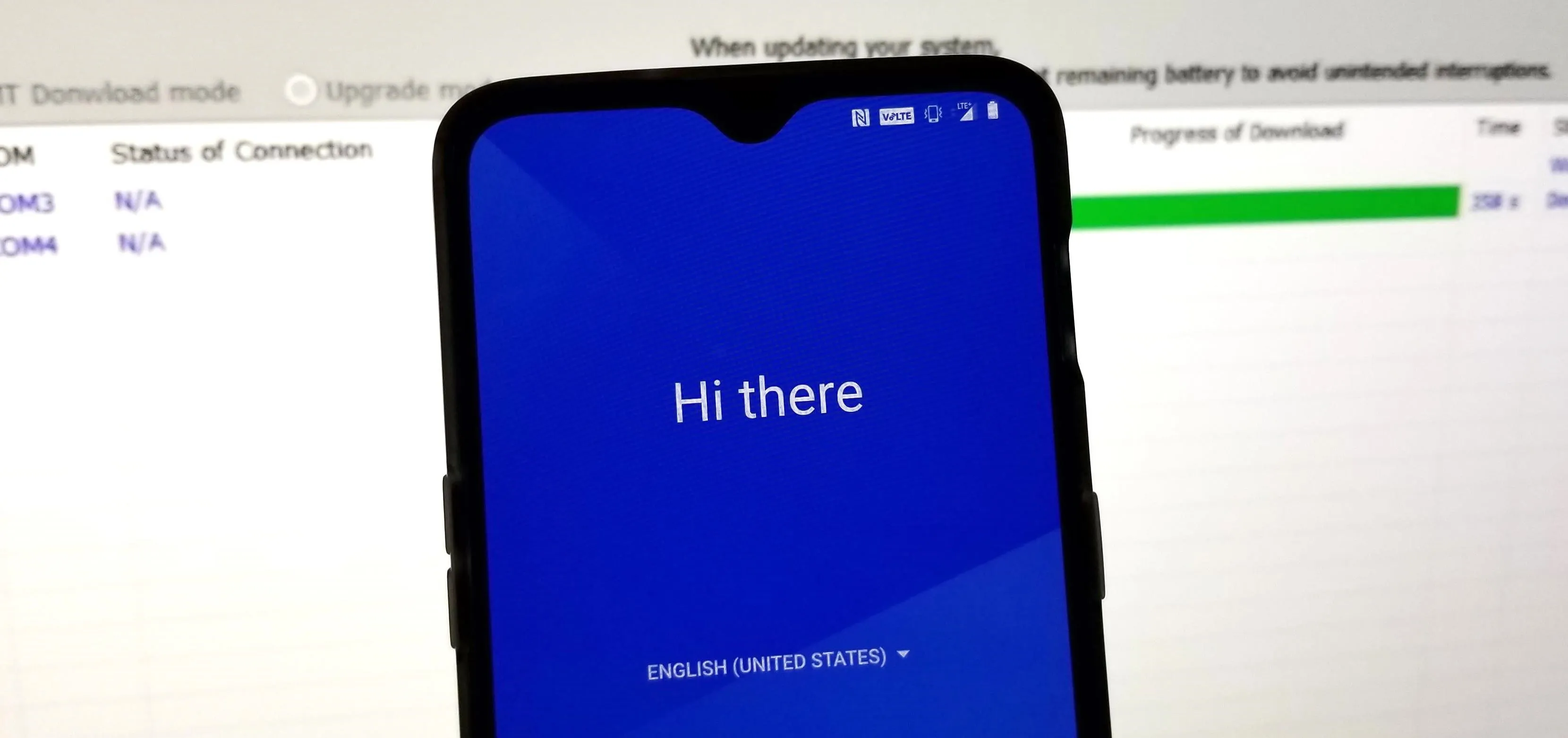 Smartphone screen displaying a greeting message "Hi there" with a progress bar in the background.