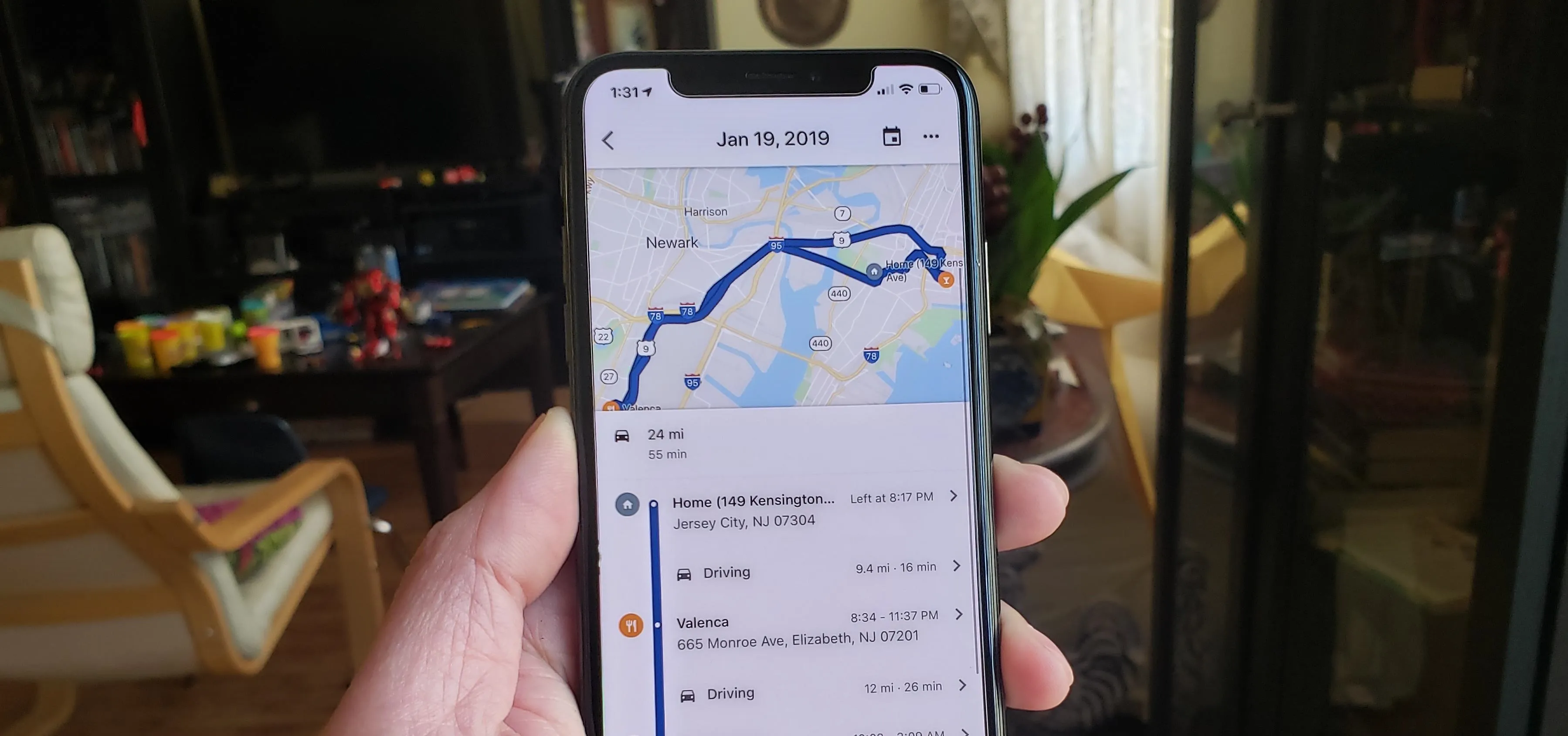 Navigation app displaying a map route on a smartphone.