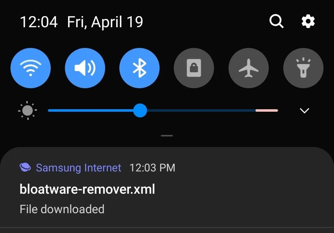 Notification panel showing a downloaded file on a smartphone.