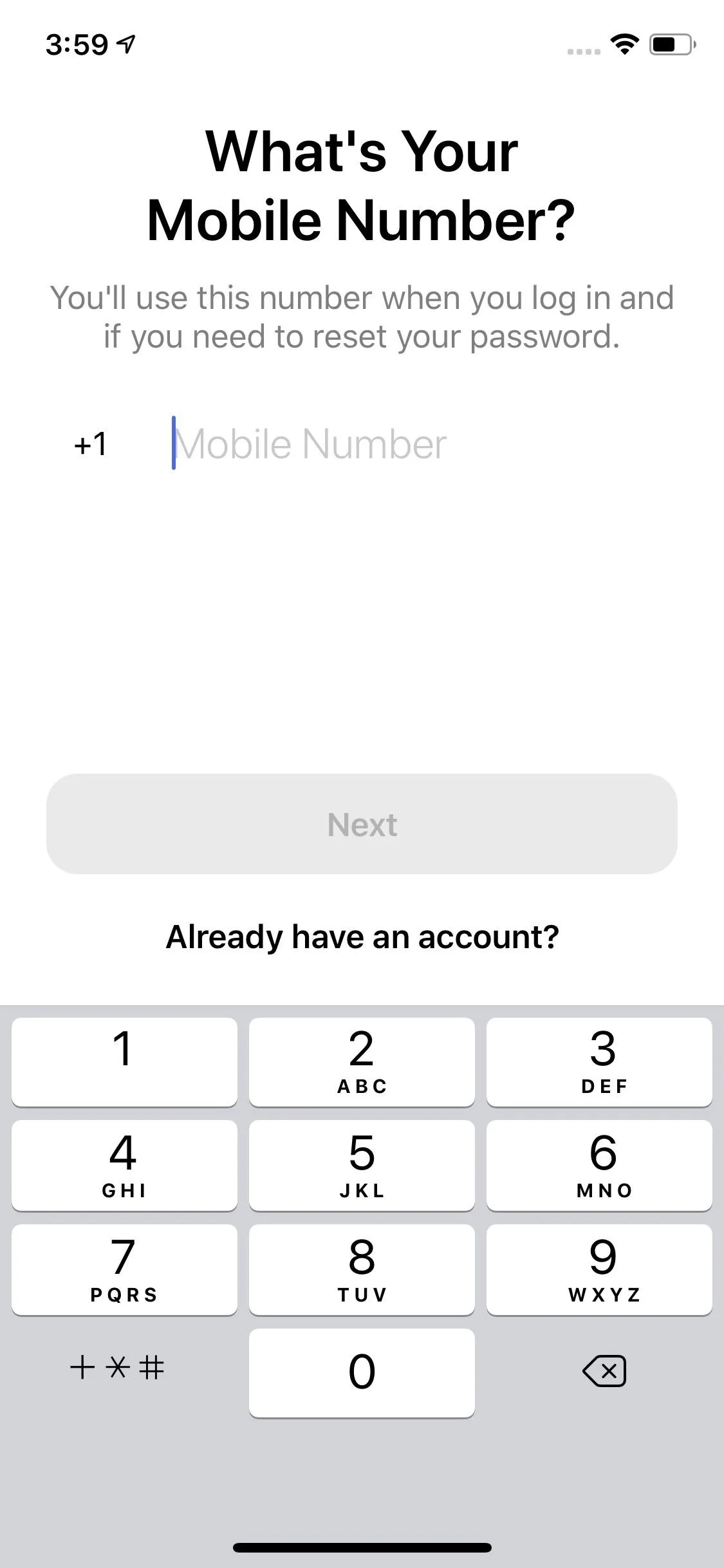 Mobile number entry screen with keypad for login.