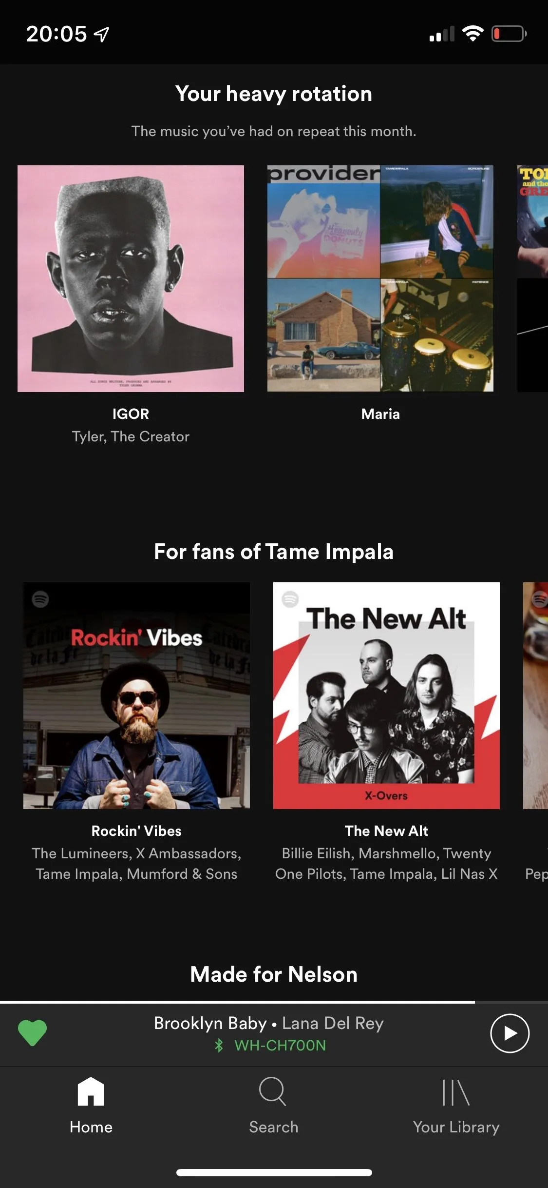 Spotify music library interface displaying various albums and playlists.