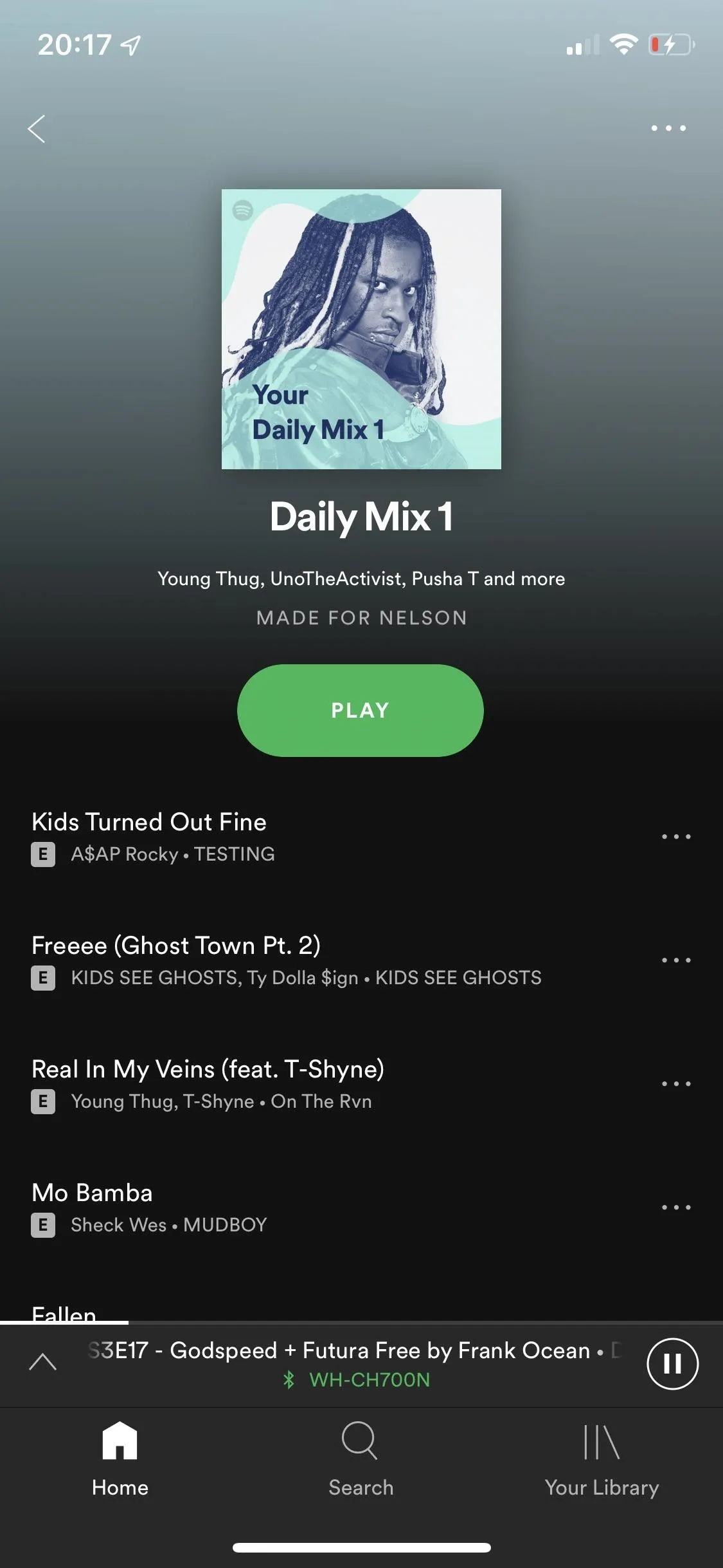 Spotify Daily Mix playlist cover with song recommendations.