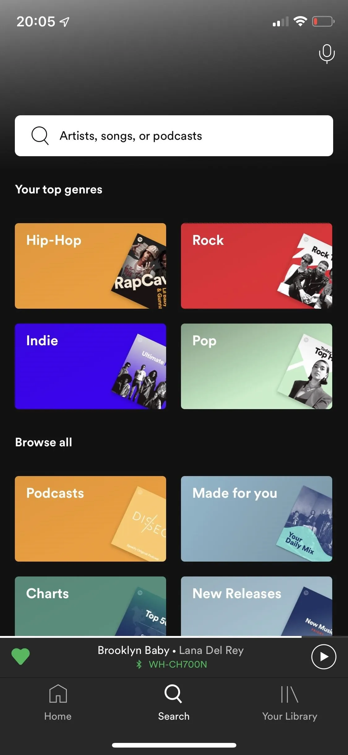 Spotify app interface showcasing various music genres and playlists.