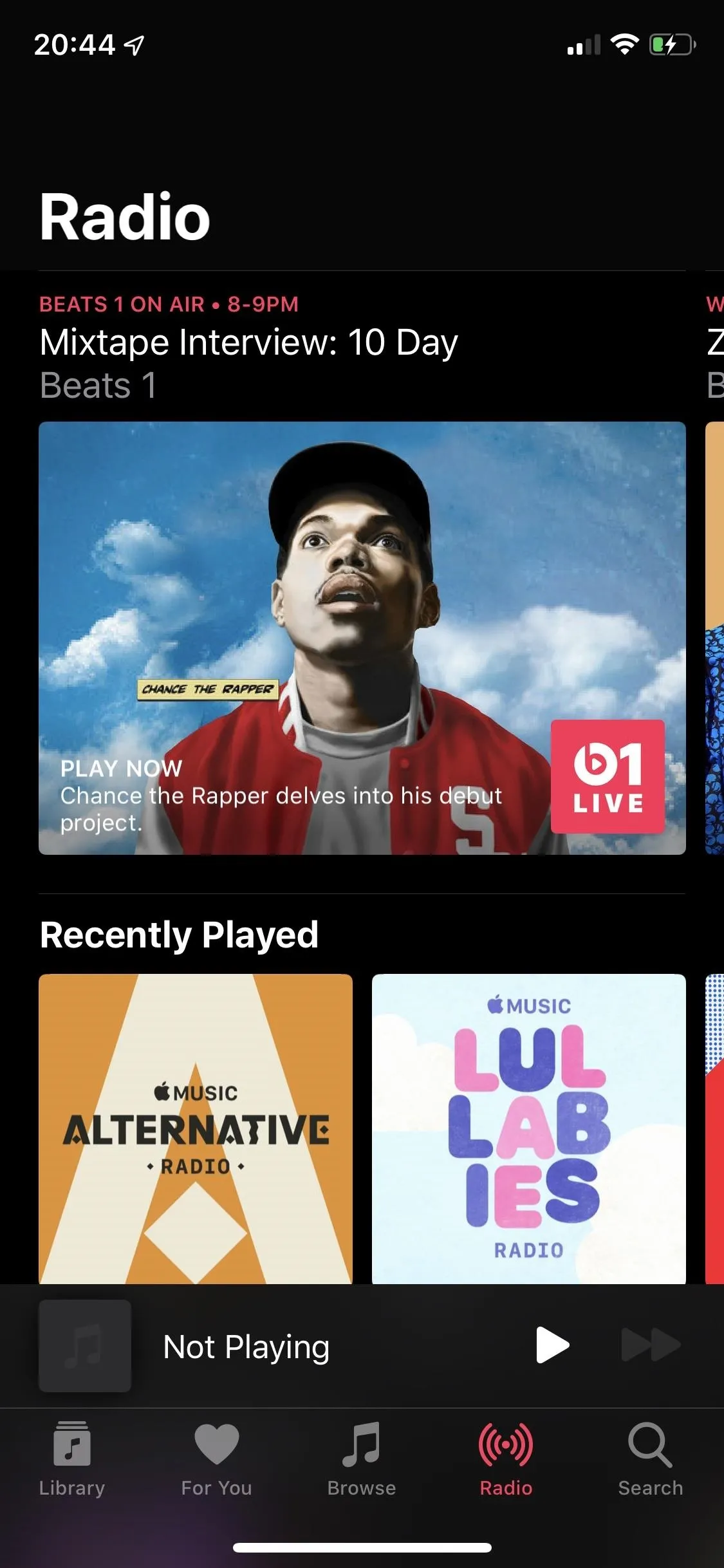 Radio app interface featuring a rapper with a red jacket and a blue background.