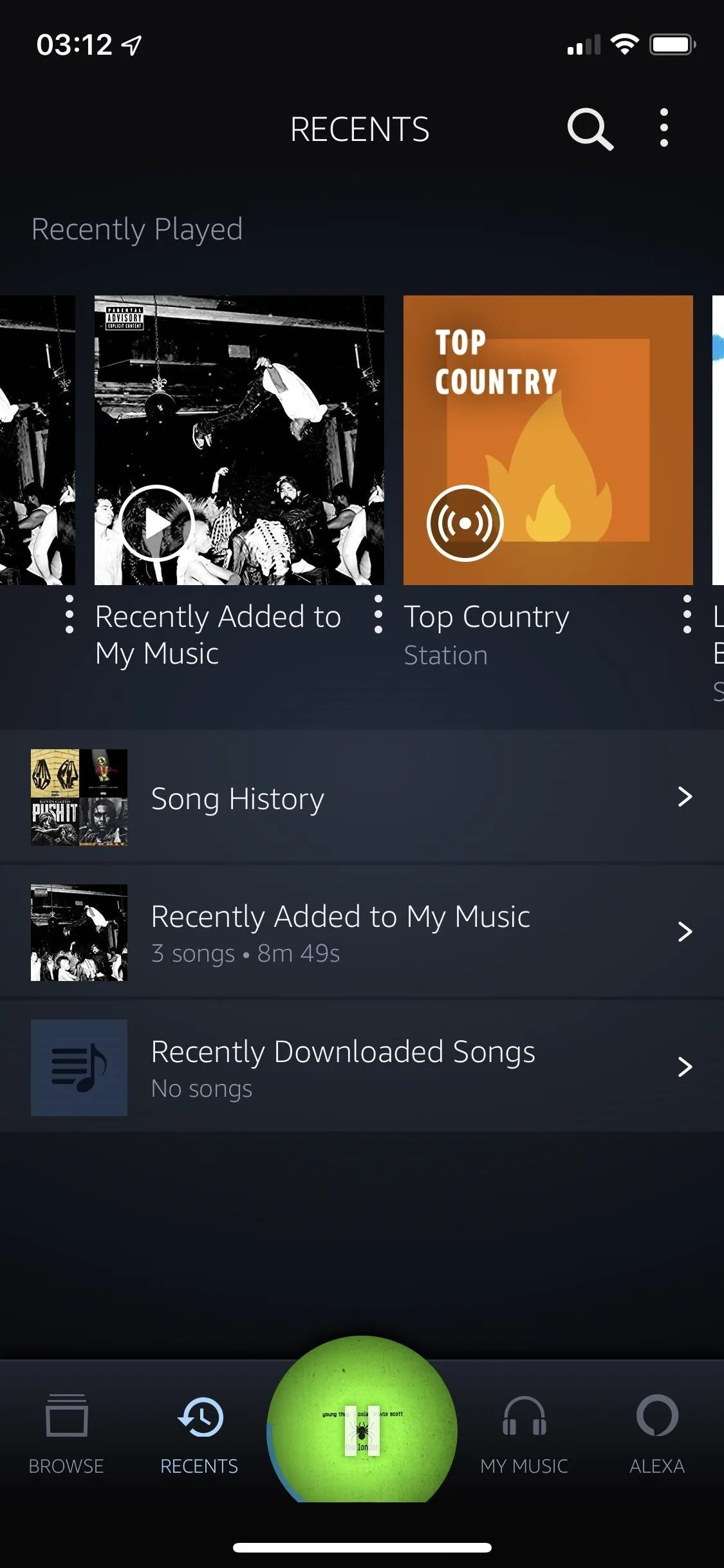 Music app interface displaying a user’s playlist with various albums and songs.