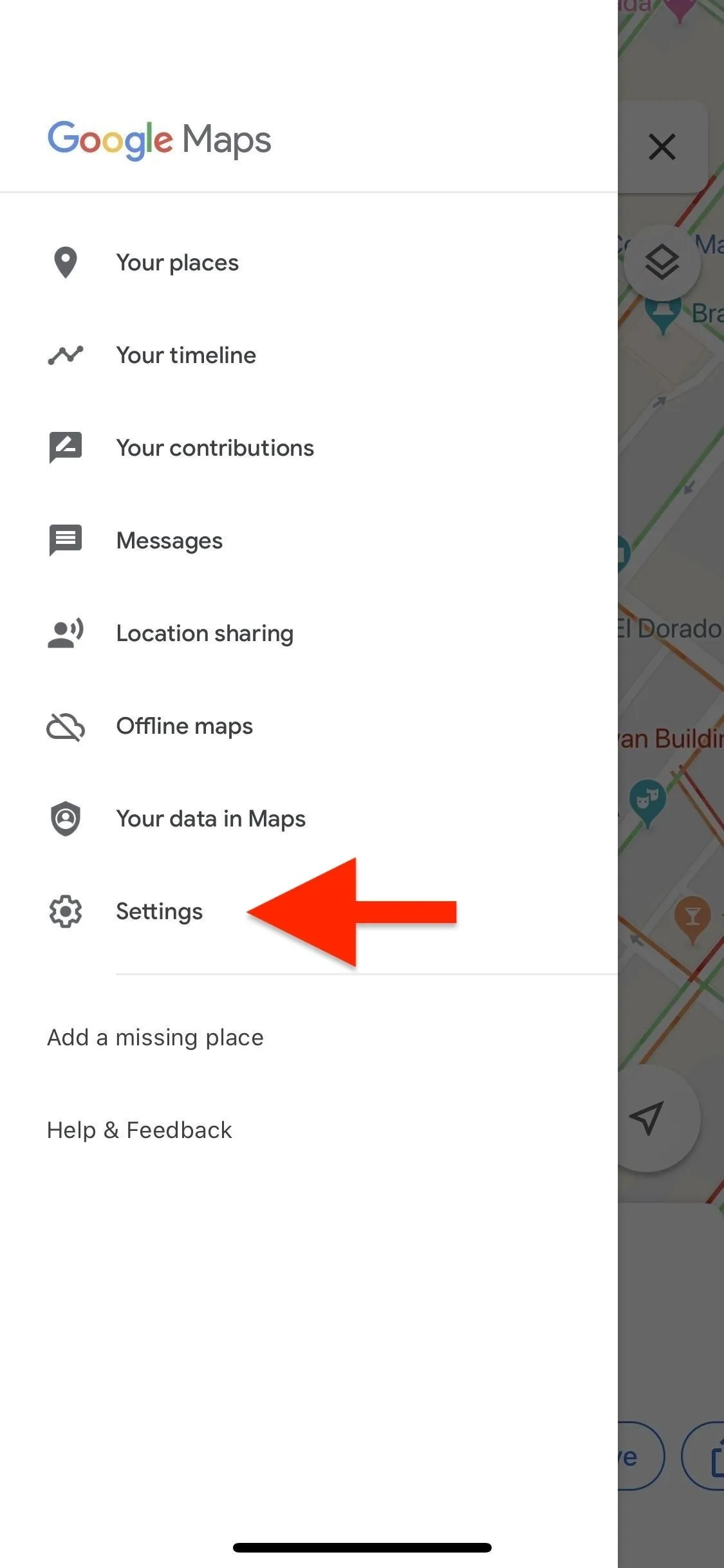 Google Maps settings menu with an arrow pointing to the settings option.