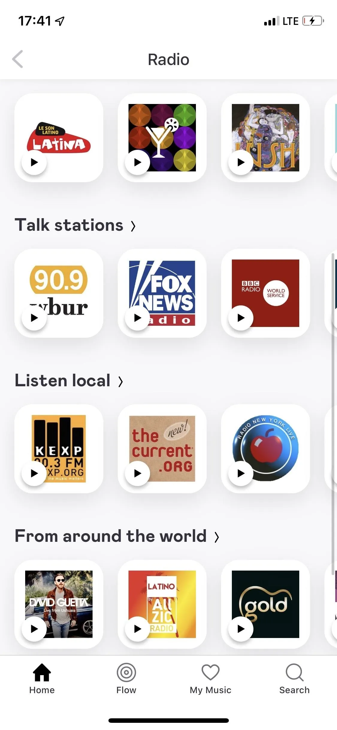 Radio app interface featuring various station categories and album artwork.