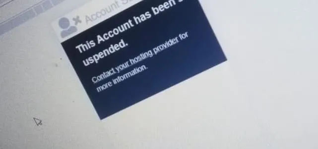 Account suspension notice with contact instructions for assistance.