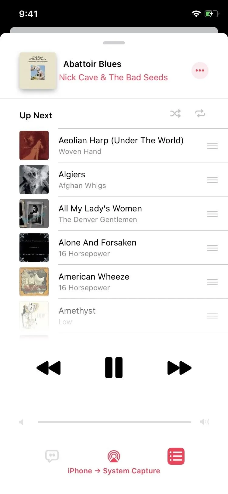 Playlist interface showing songs by various artists on a music app.