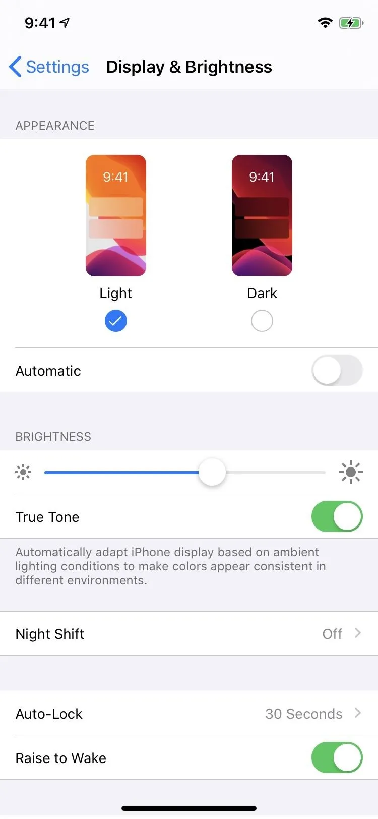 Settings menu displaying display and brightness options on a smartphone.