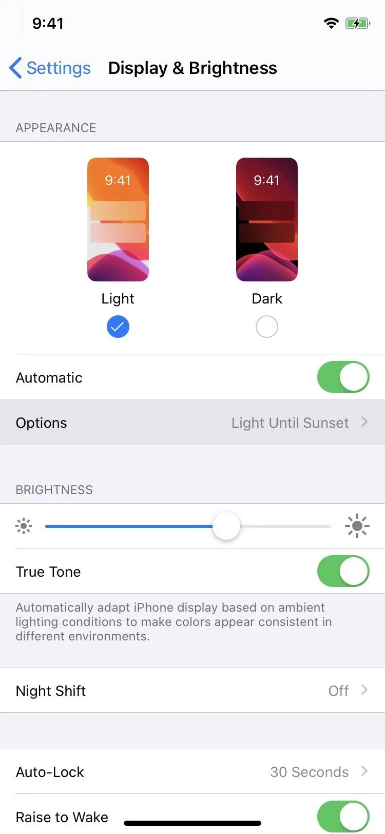 Display settings options for brightness and color temperature on a smartphone.