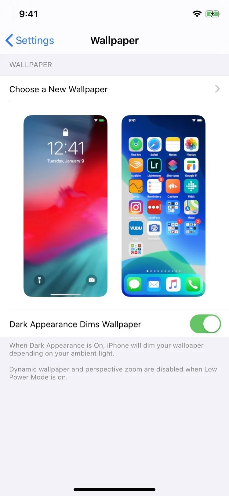 iPhone settings screen displaying wallpaper options with a colorful interface.