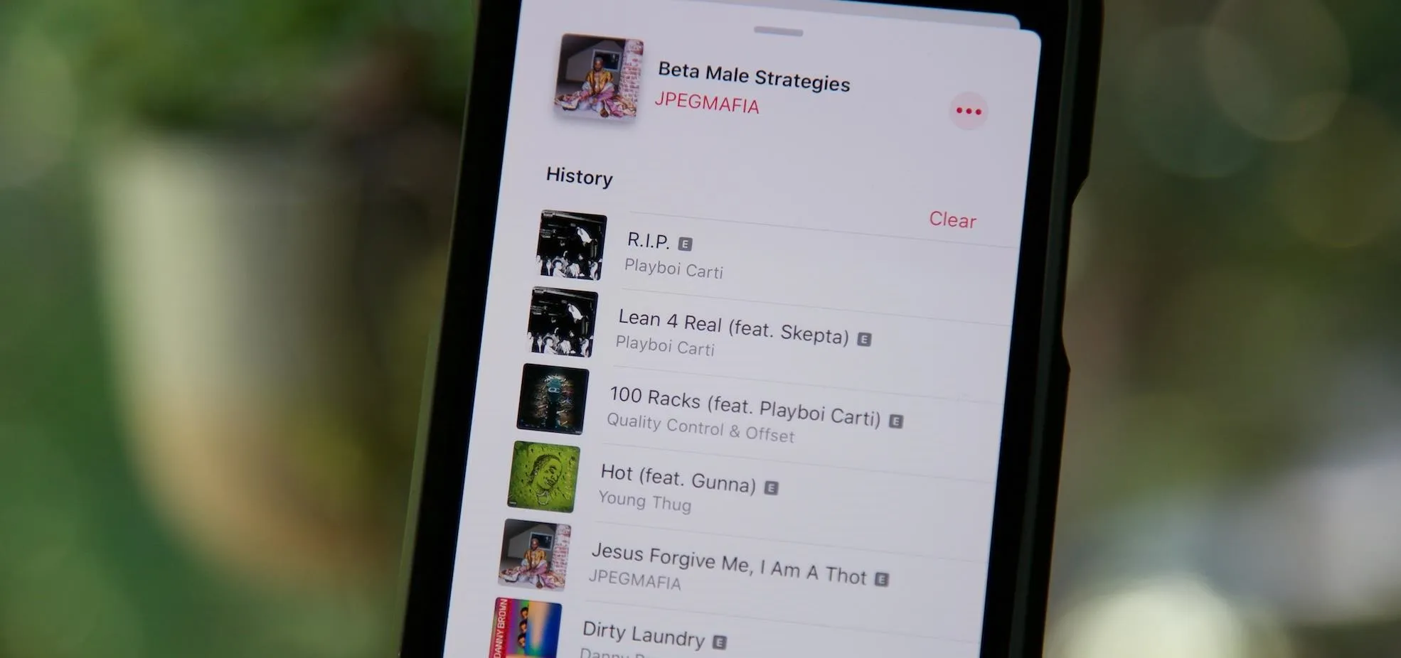 Music playlist displayed on a smartphone screen.