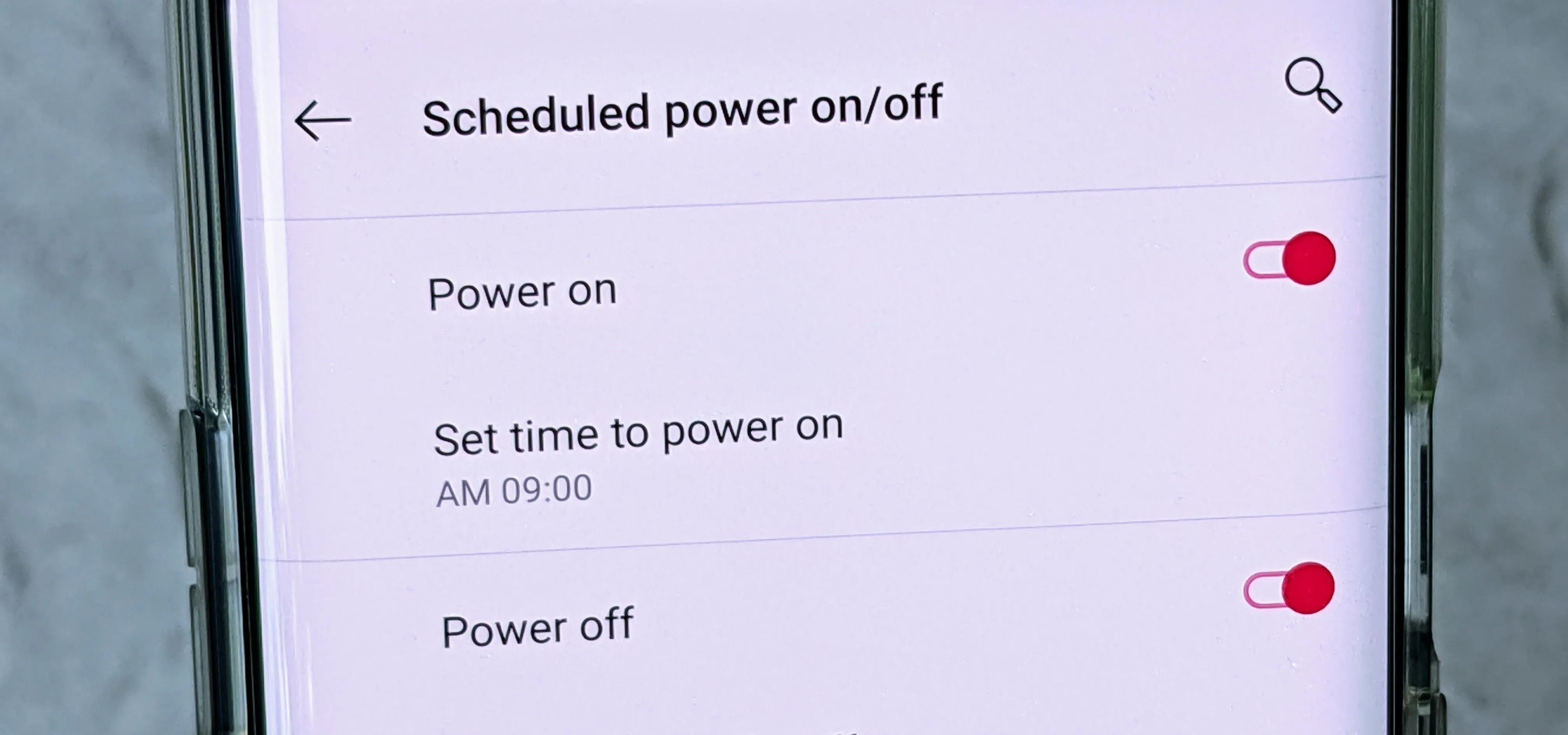 Scheduled power on/off settings on a mobile device.