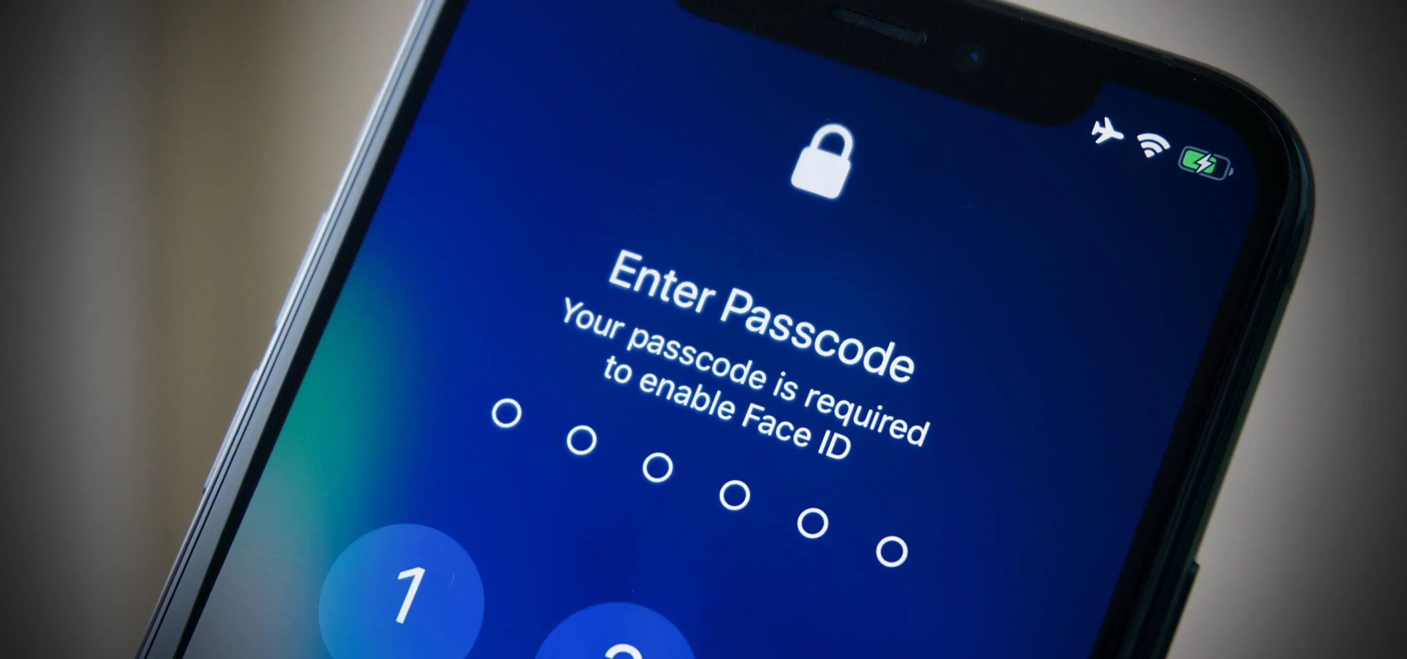 Smartphone screen displaying a passcode entry for security.