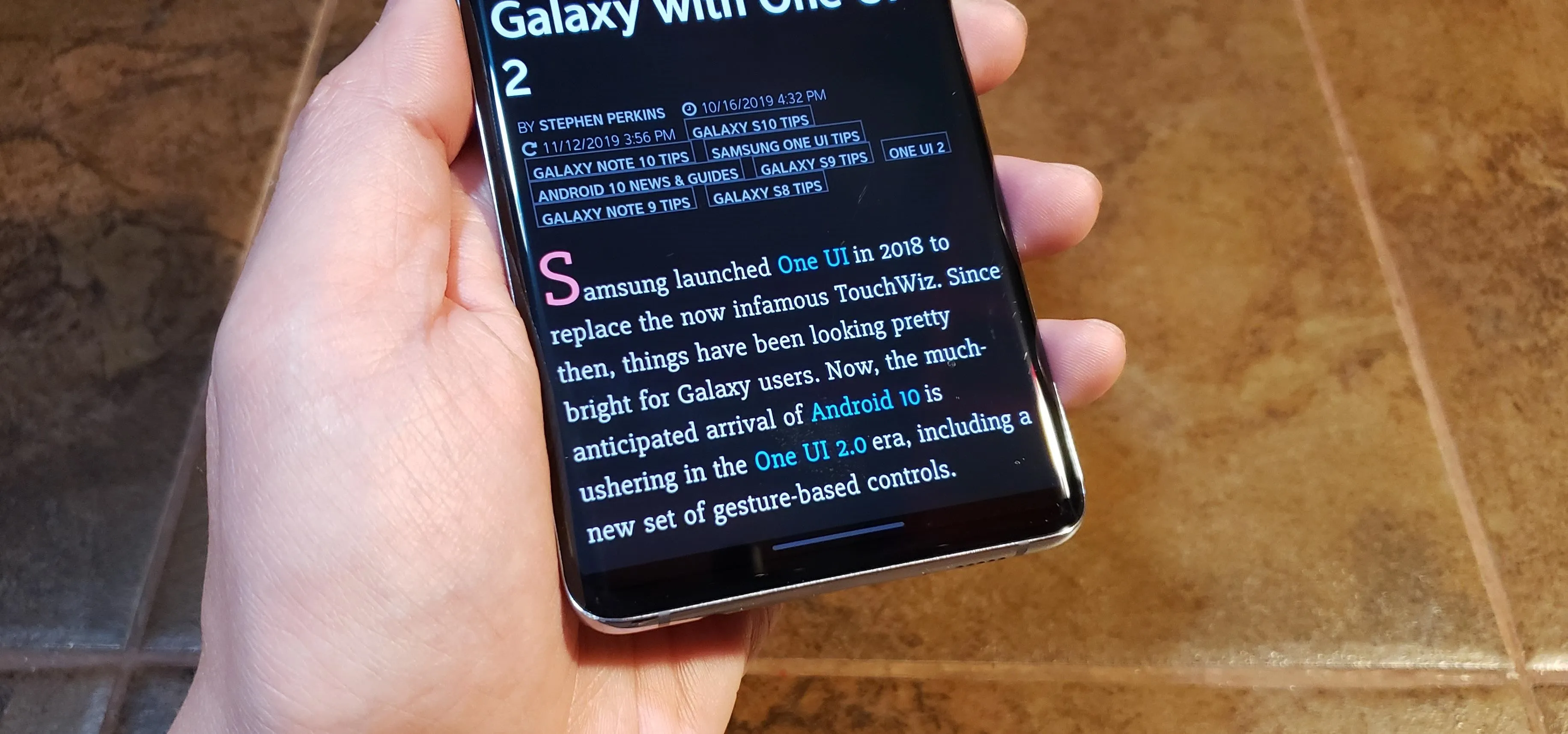 Smartphone displaying text about the Galaxy Watch 2.