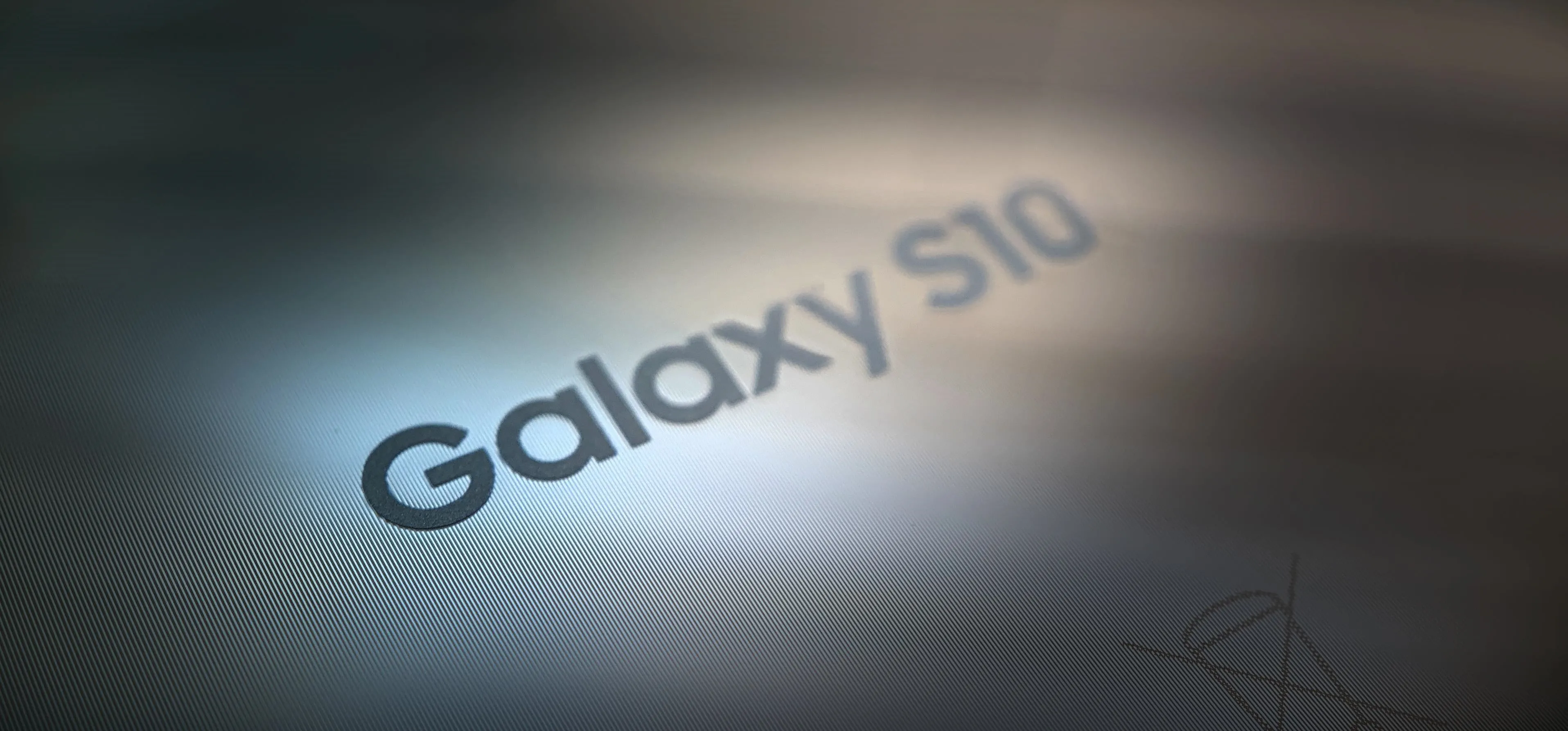 Galaxy S10 logo on a reflective surface