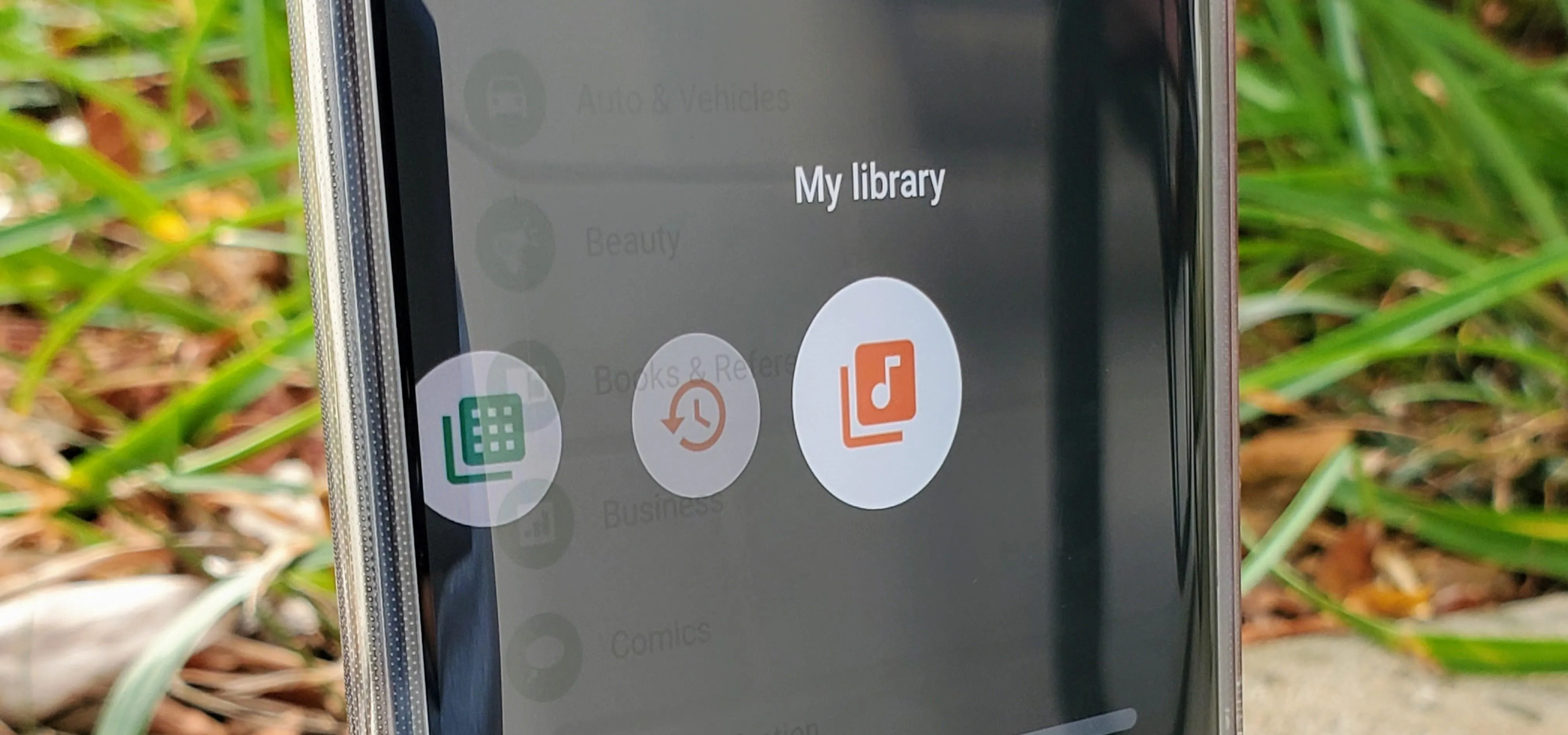 Mobile app interface showing "My Library" with three icons on a smartphone screen.