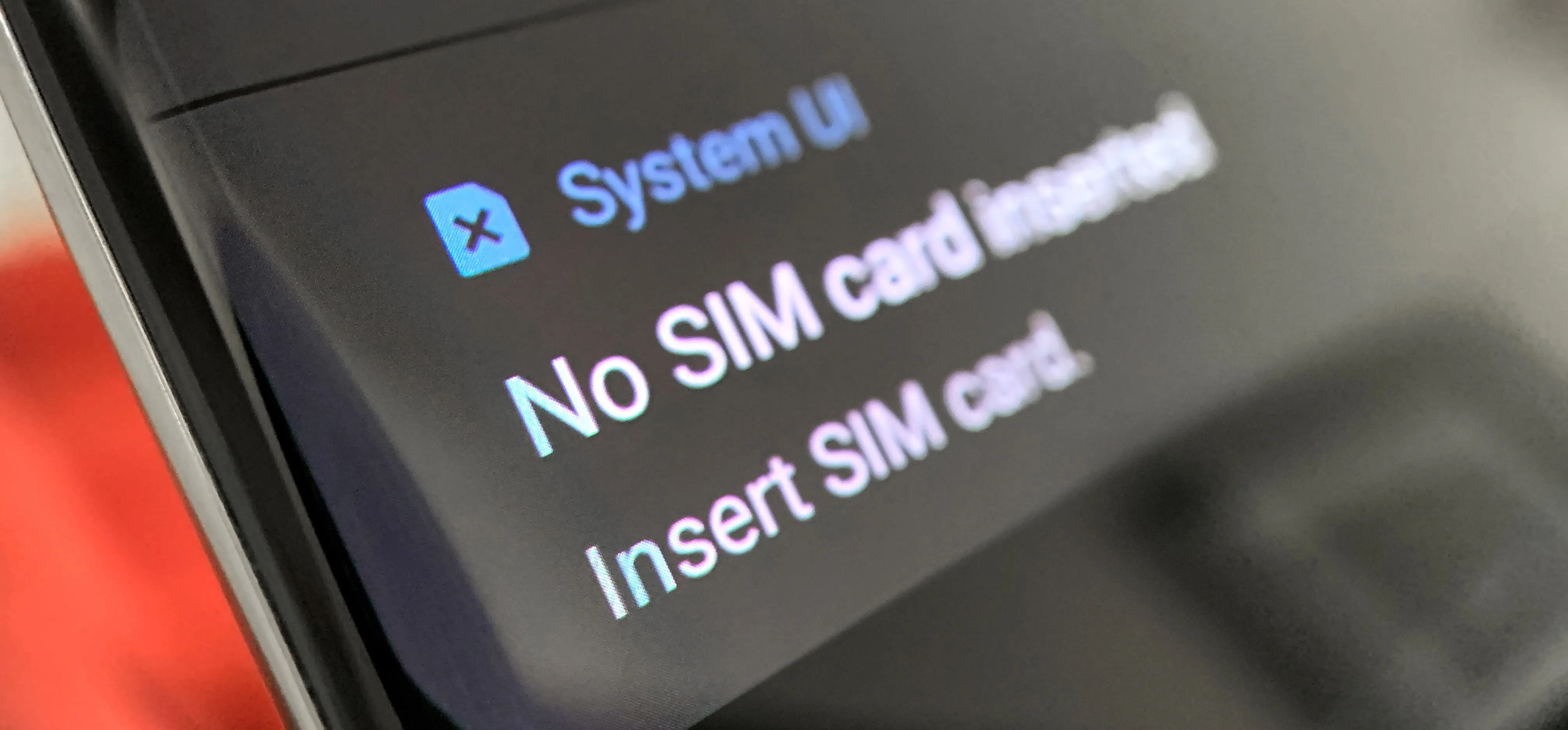 Error message on a smartphone screen indicating "No SIM card installed" and prompt to "Insert SIM card."