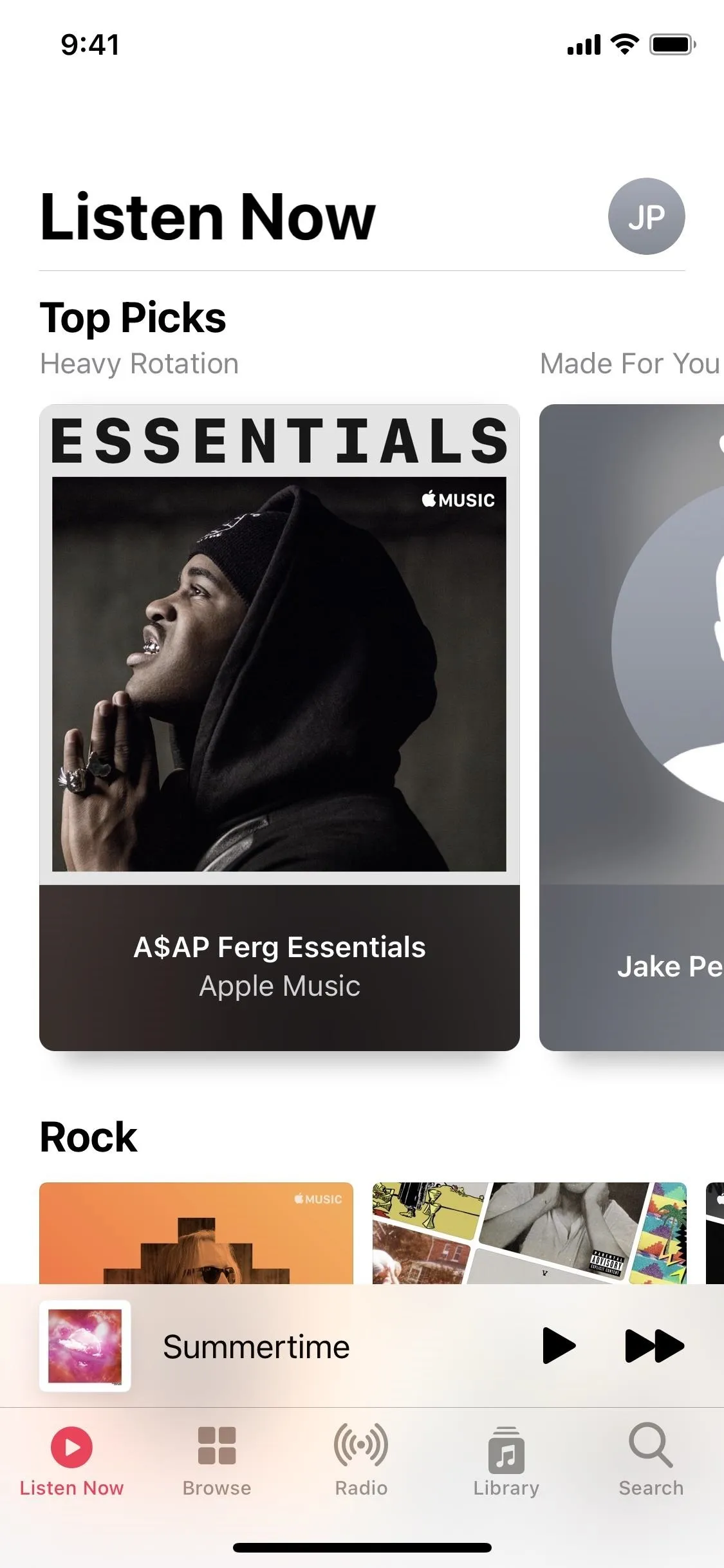 Album cover featuring a person in profile, listening intently, with the title "Essentials" prominently displayed.