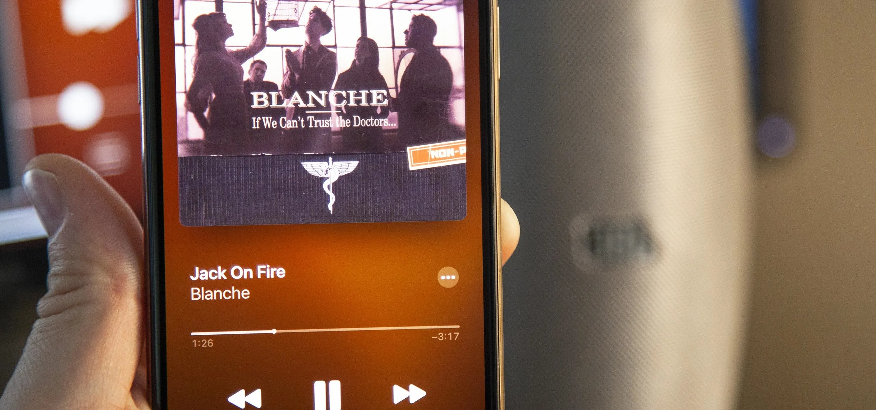 Music player screen displaying the song "Black On Fire" by Blanche.