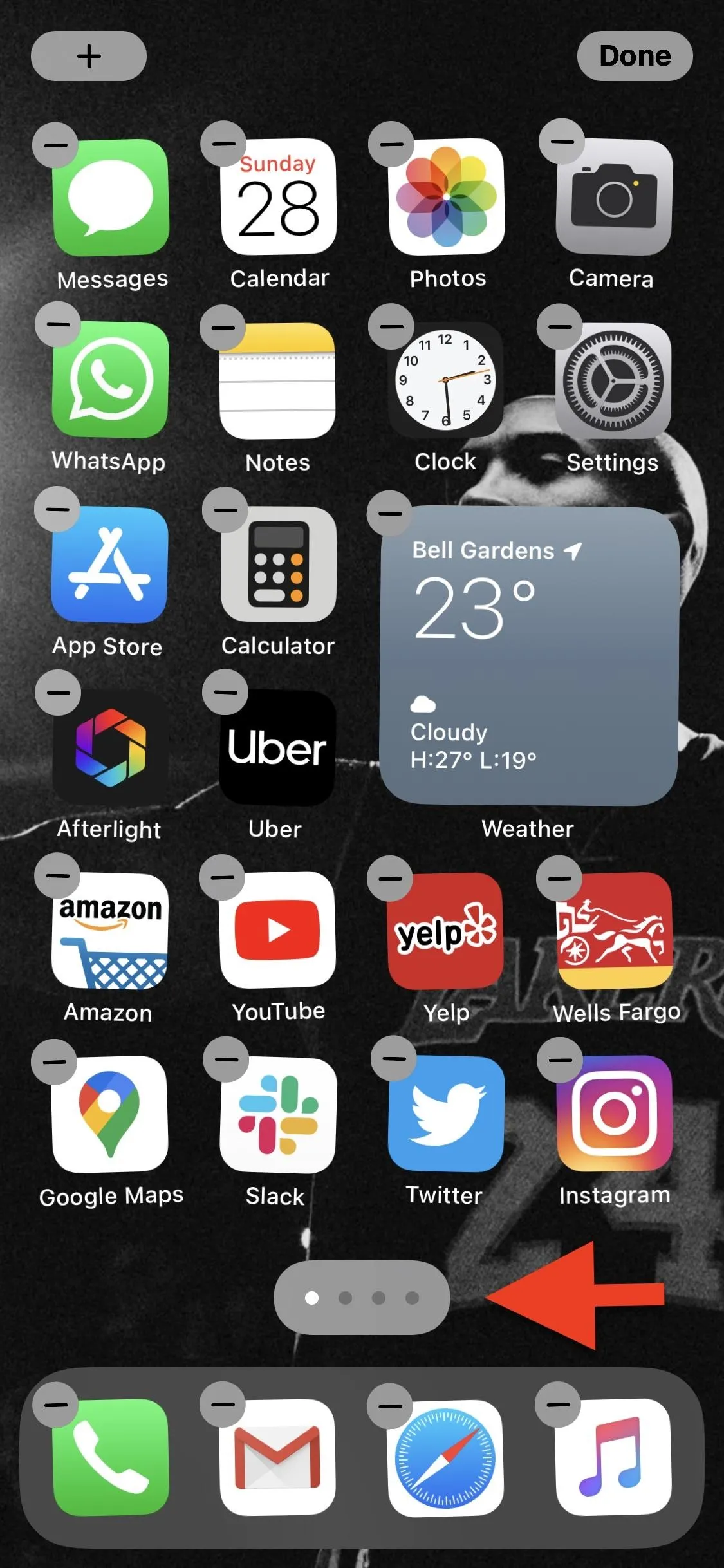 Smartphone screen displaying various app icons and a weather widget.