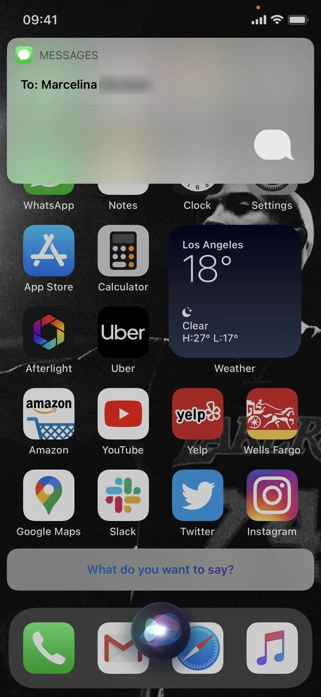 Smartphone home screen displaying apps and a notification.