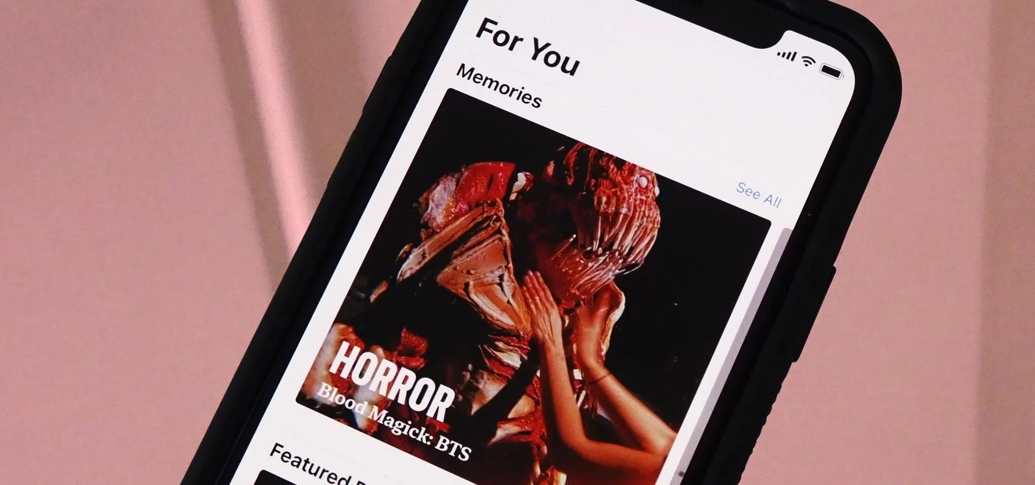 Horror movie recommendations displayed on a smartphone.