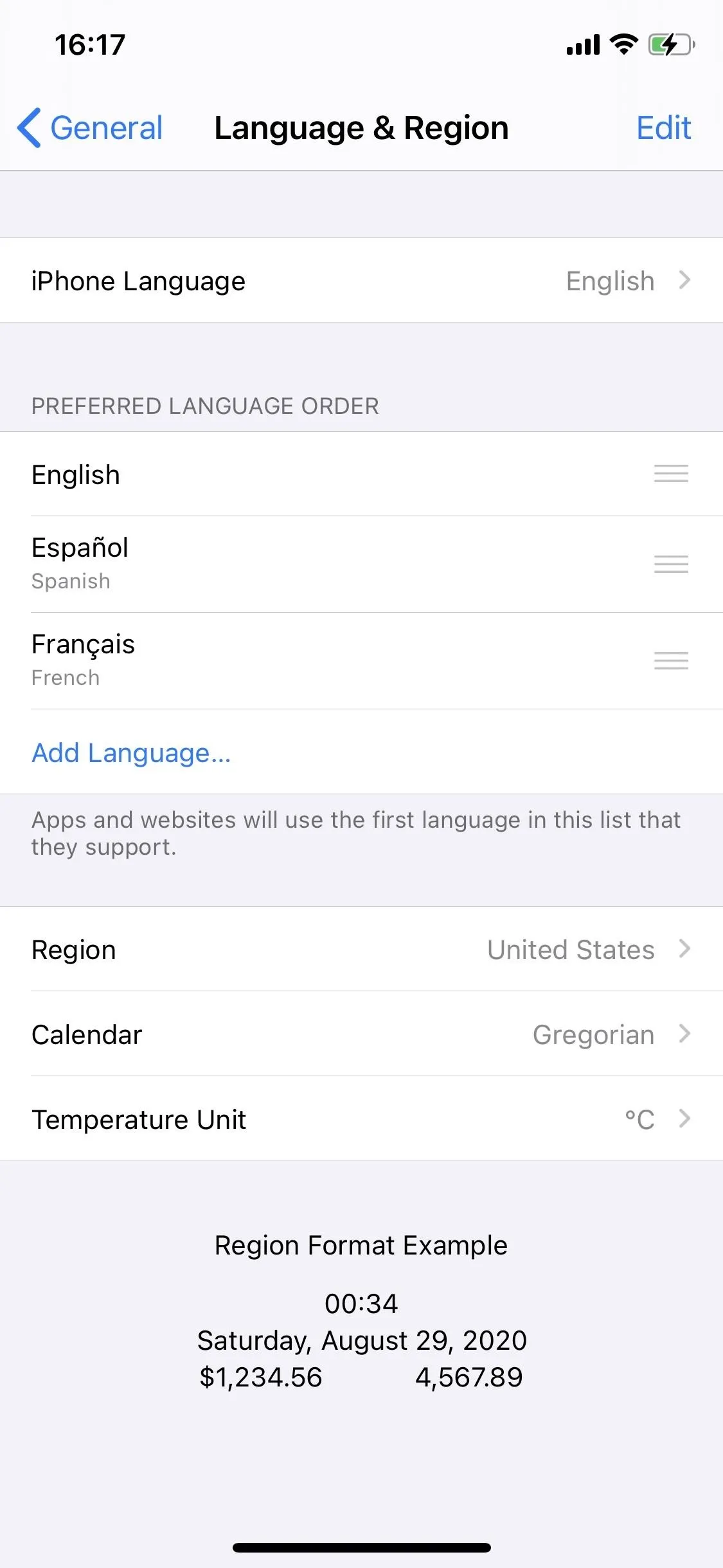 Language and region settings on a mobile device screen.