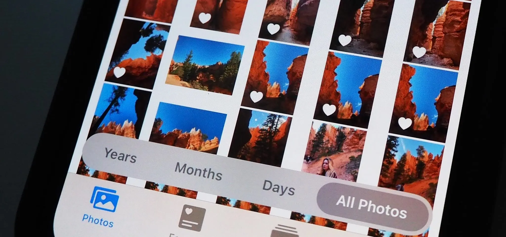 Photo gallery interface displaying various images of red rock formations with filters for sorting by years, months, and days.