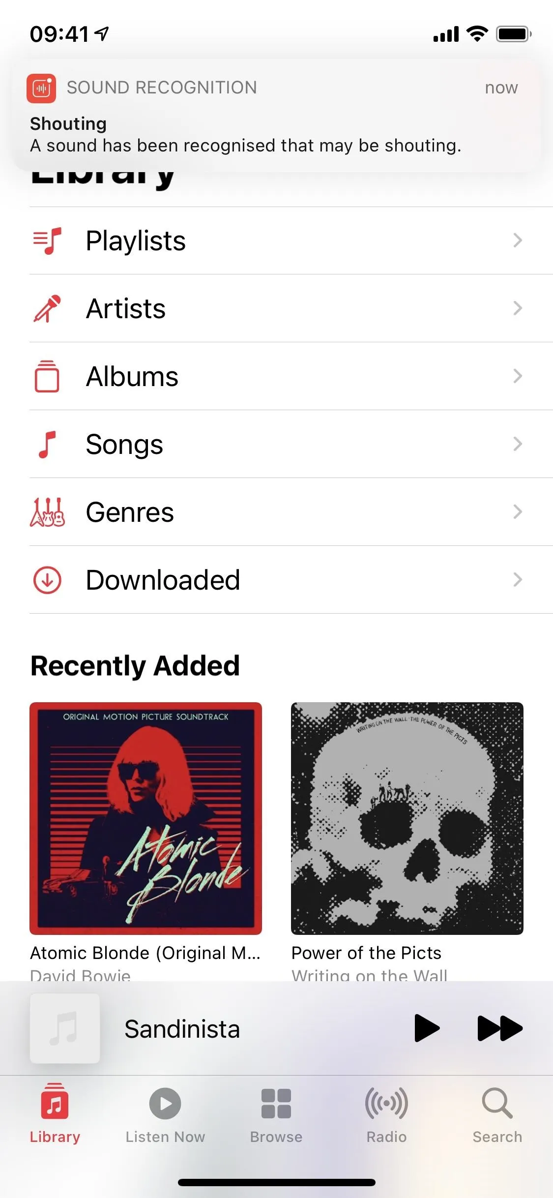 Music app interface displaying recently added songs with artwork.